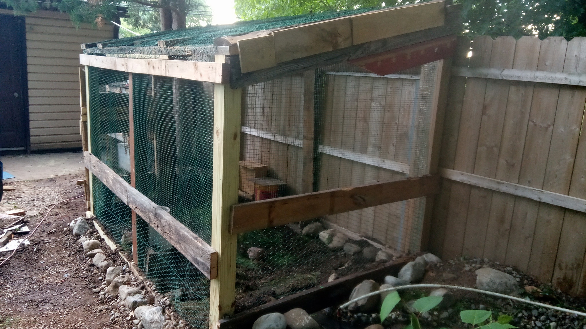 My new Quail run. 10x5x6ft Built out of leftovers/salvaged lumber