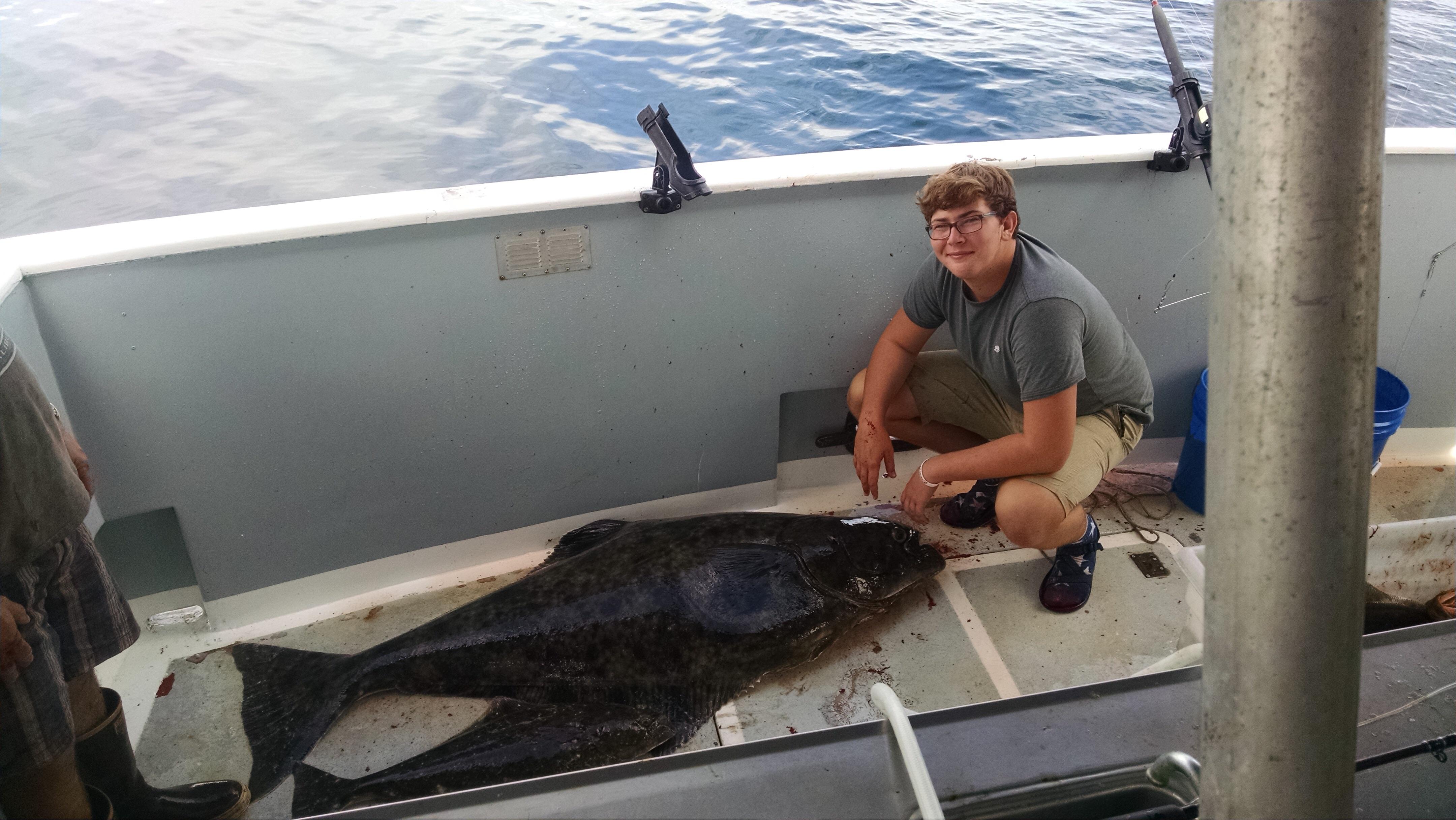 215 pound Halibut caught in Alaska. Caught on 30 pound test while
