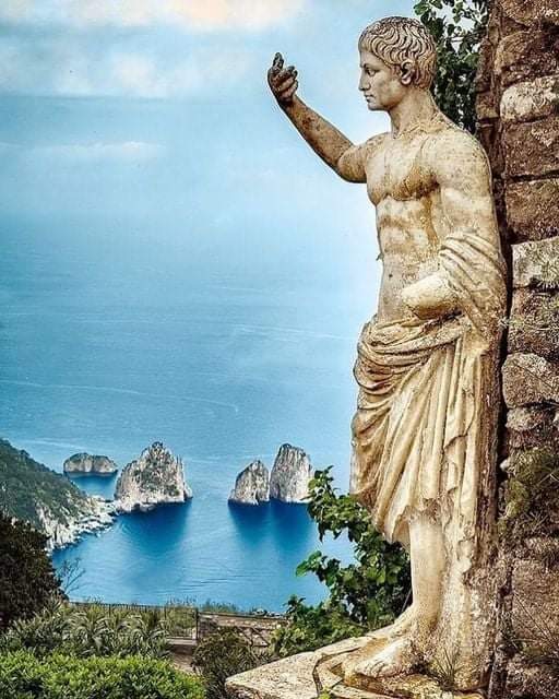 Statue of Augustus in Capri, Italy, overlooking the bay and the