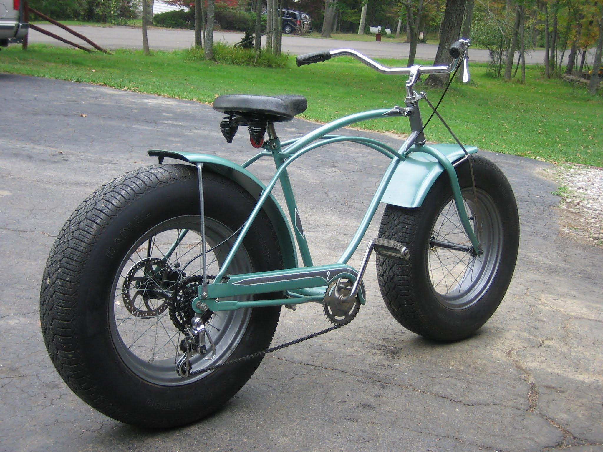 Folks putting car tires on bicycles. r/ofcoursethatsathing
