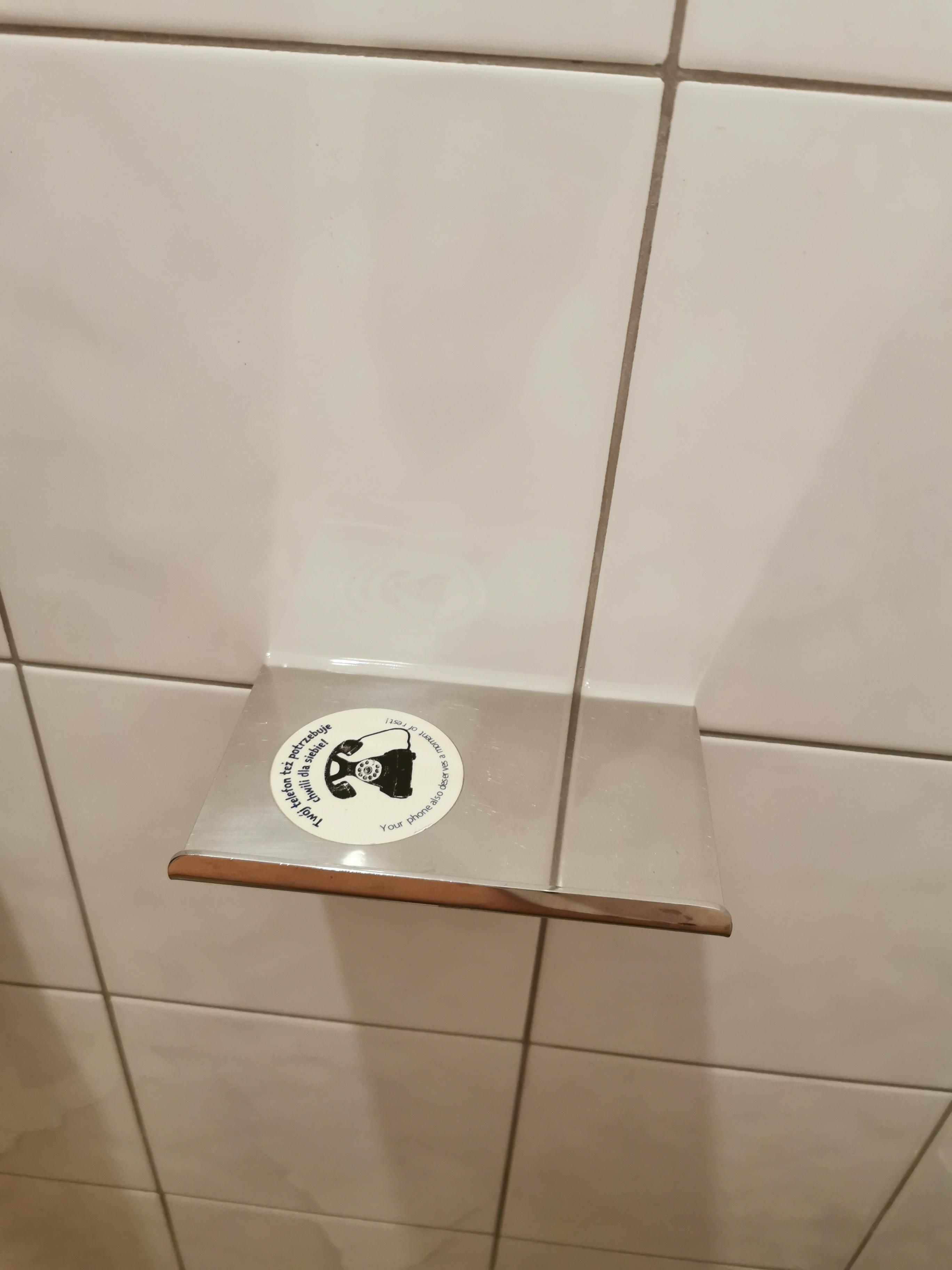 There is a phone bed in a hotel bathroom r/mildlyinteresting