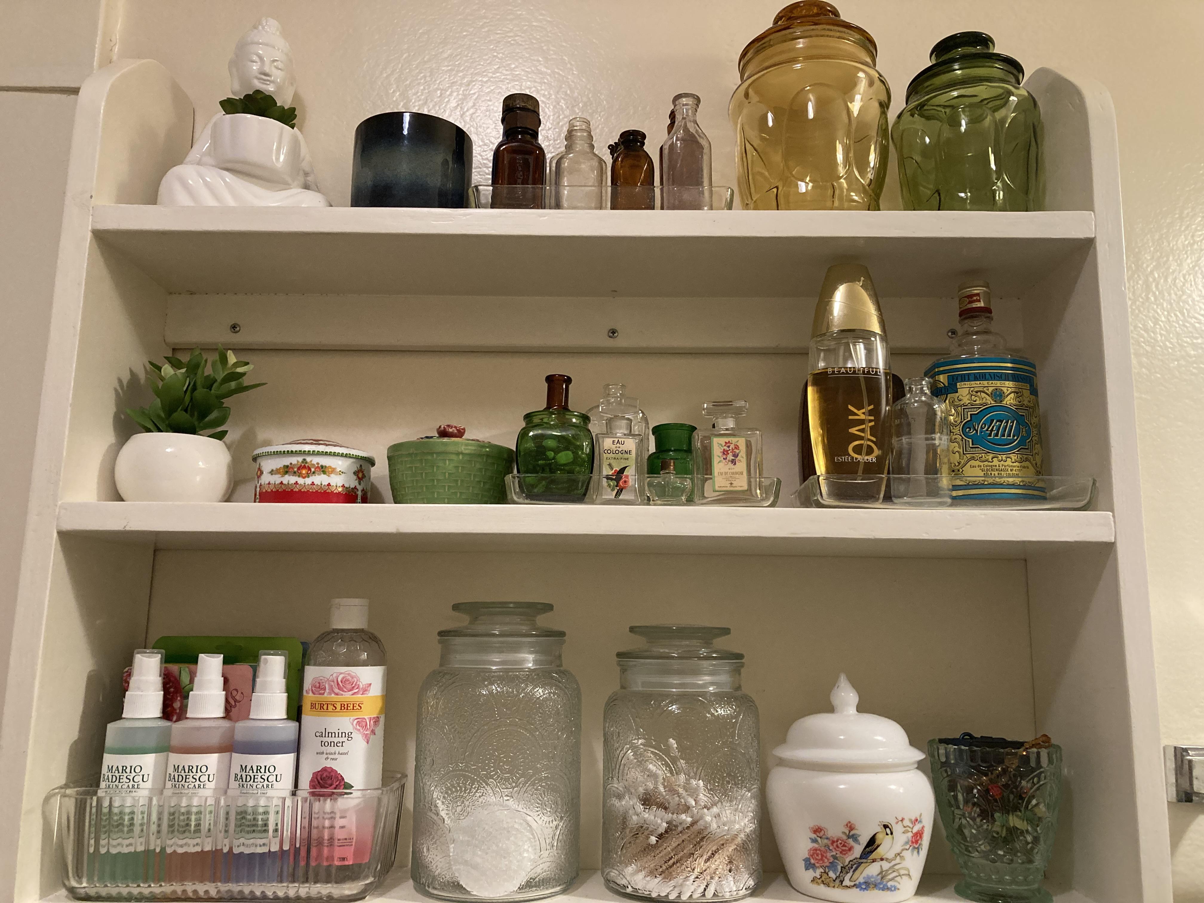 Bathroom shelf organization with my bottle/jar collection r