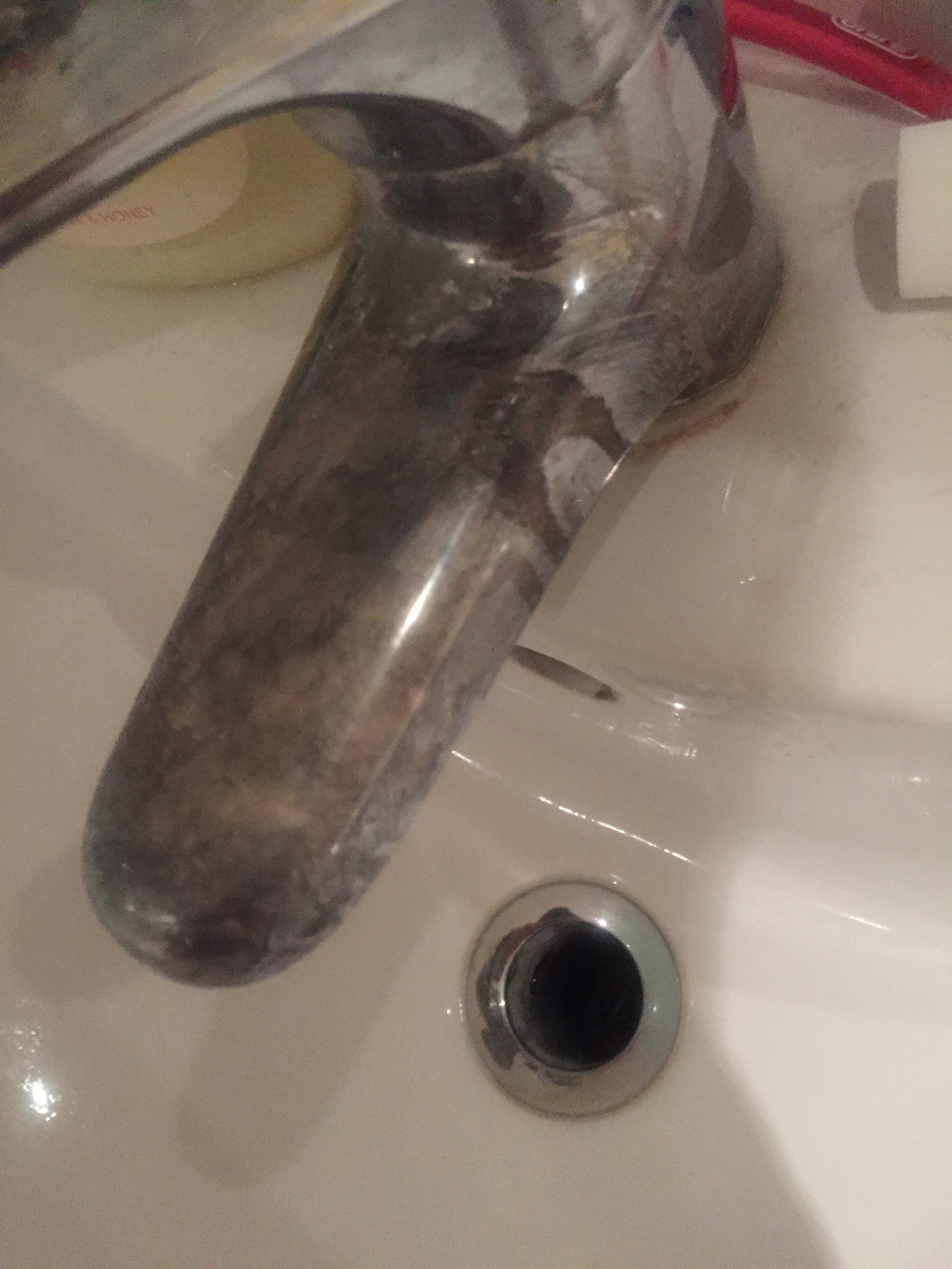 How to clean bath taps? Just moved in and the tap looks as follows. I tried a lot of things but