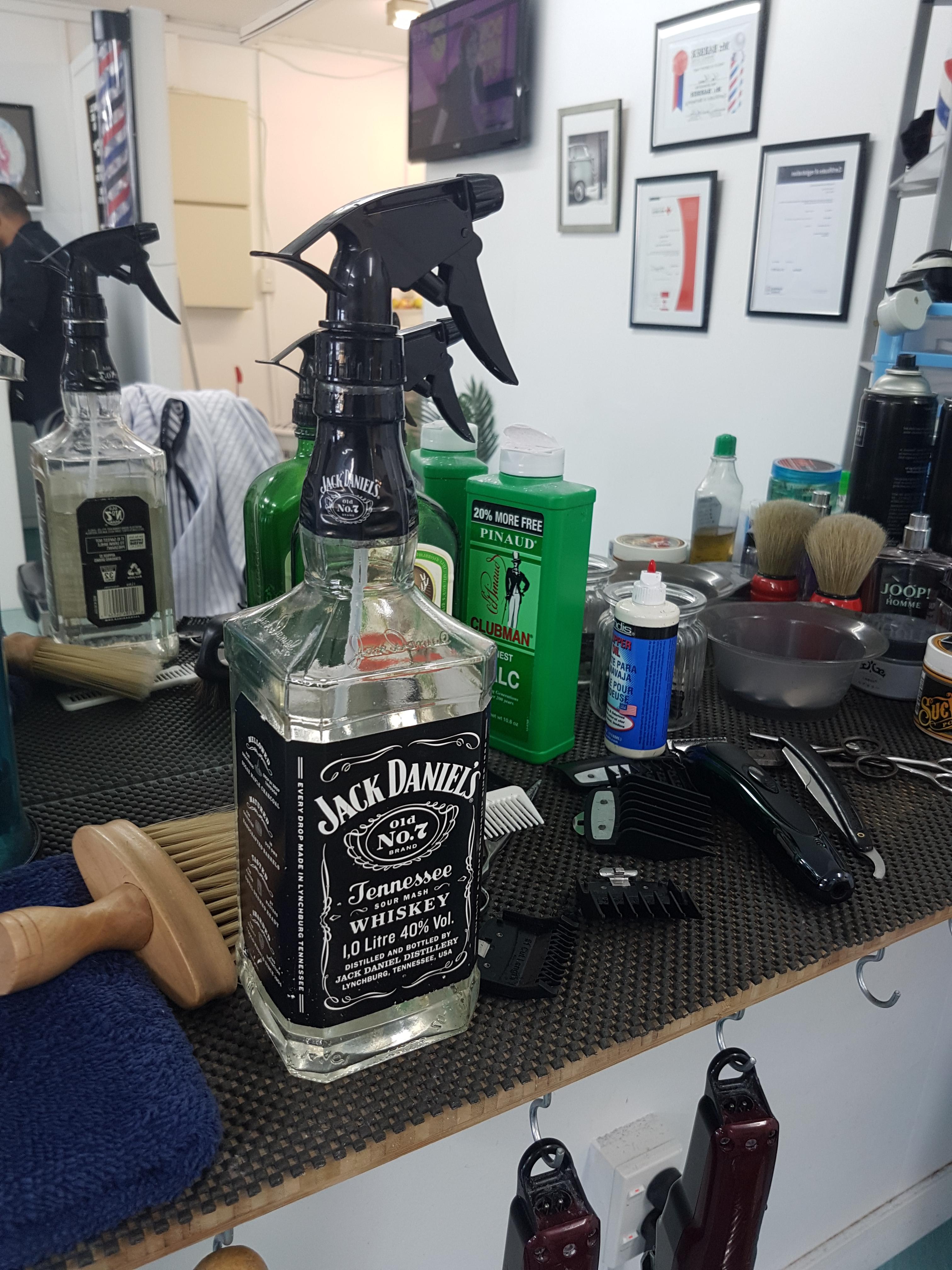 My new barbers hair spray r/pics