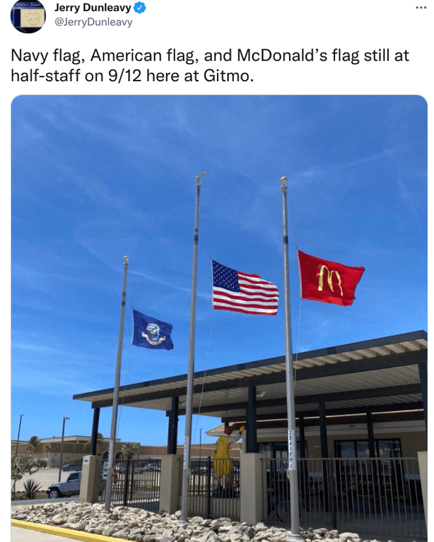 Navy flag, American flag, and McDonald’s flag still at halfstaff on 9/