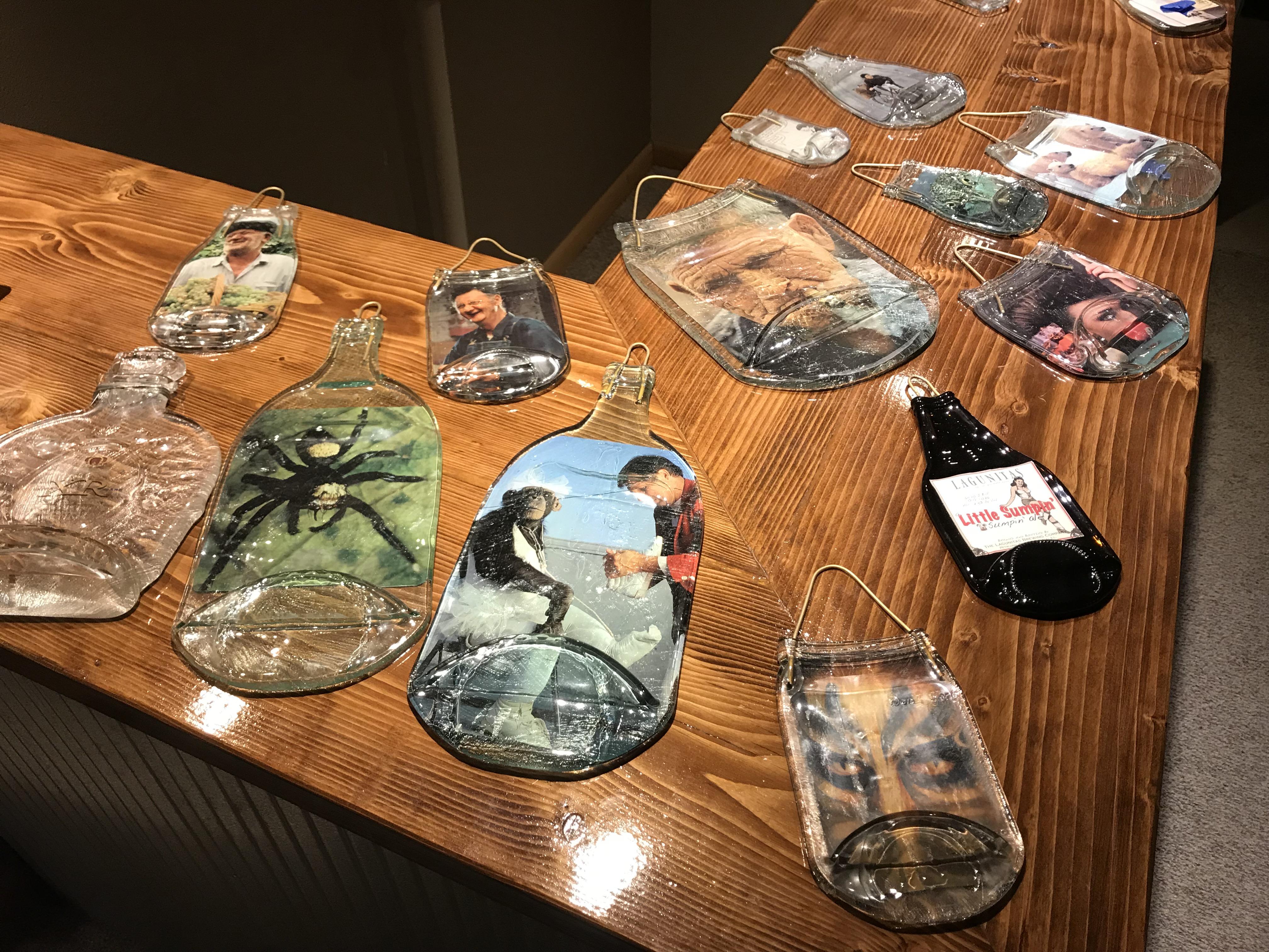 These are uniquely melted glass bottles that were formed in a kiln