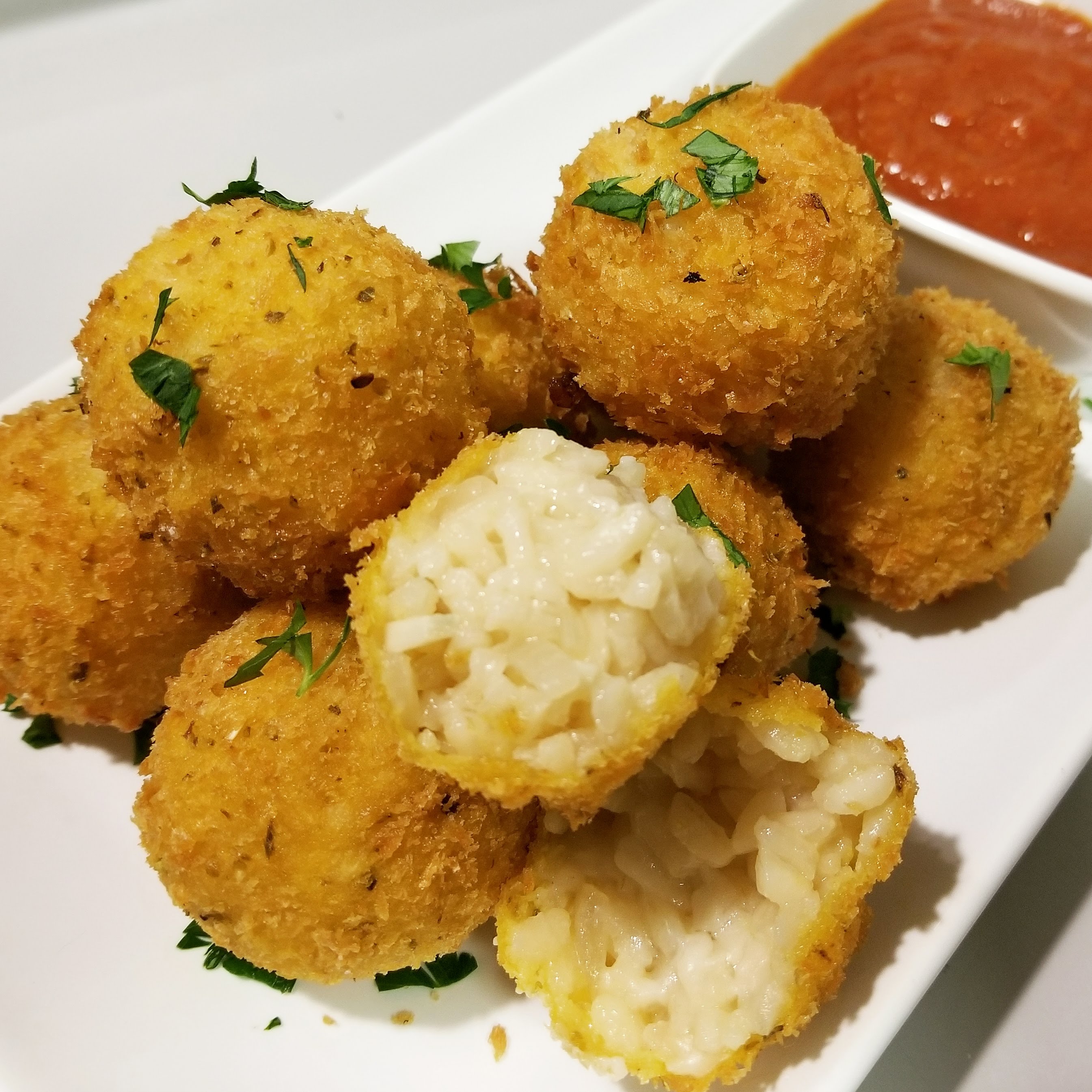 Arancini Fried risotto balls stuffed with vegan mozzarella r