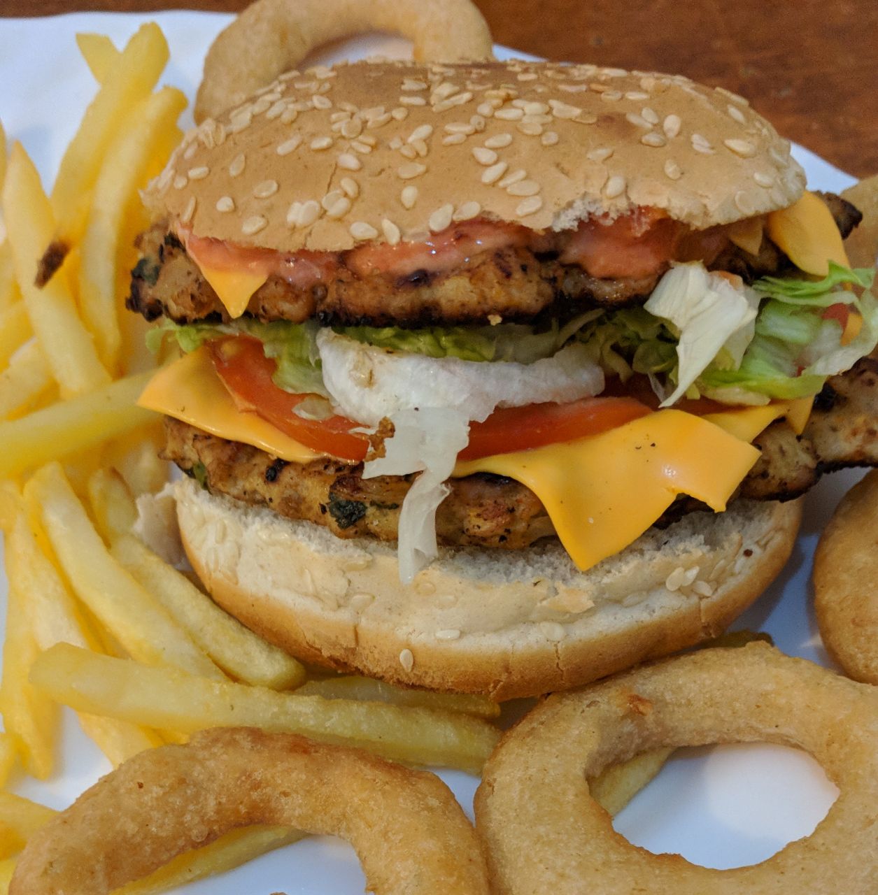 [homemade] double turkey burger with fries and onion rings r/food