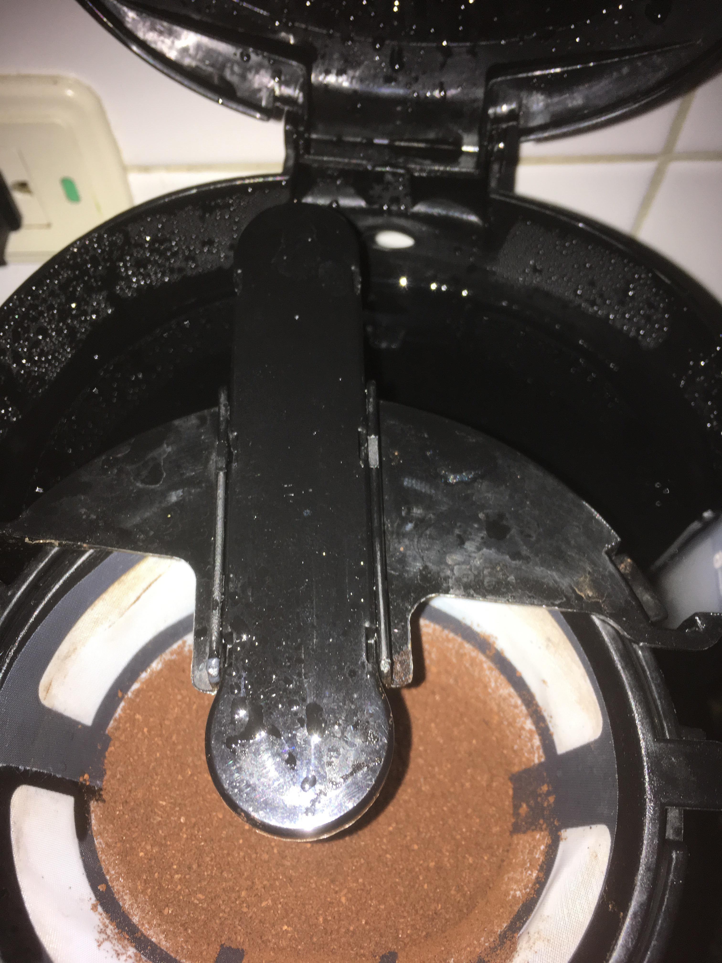 My coffee maker water nozzle it's tilted to the left instead of being