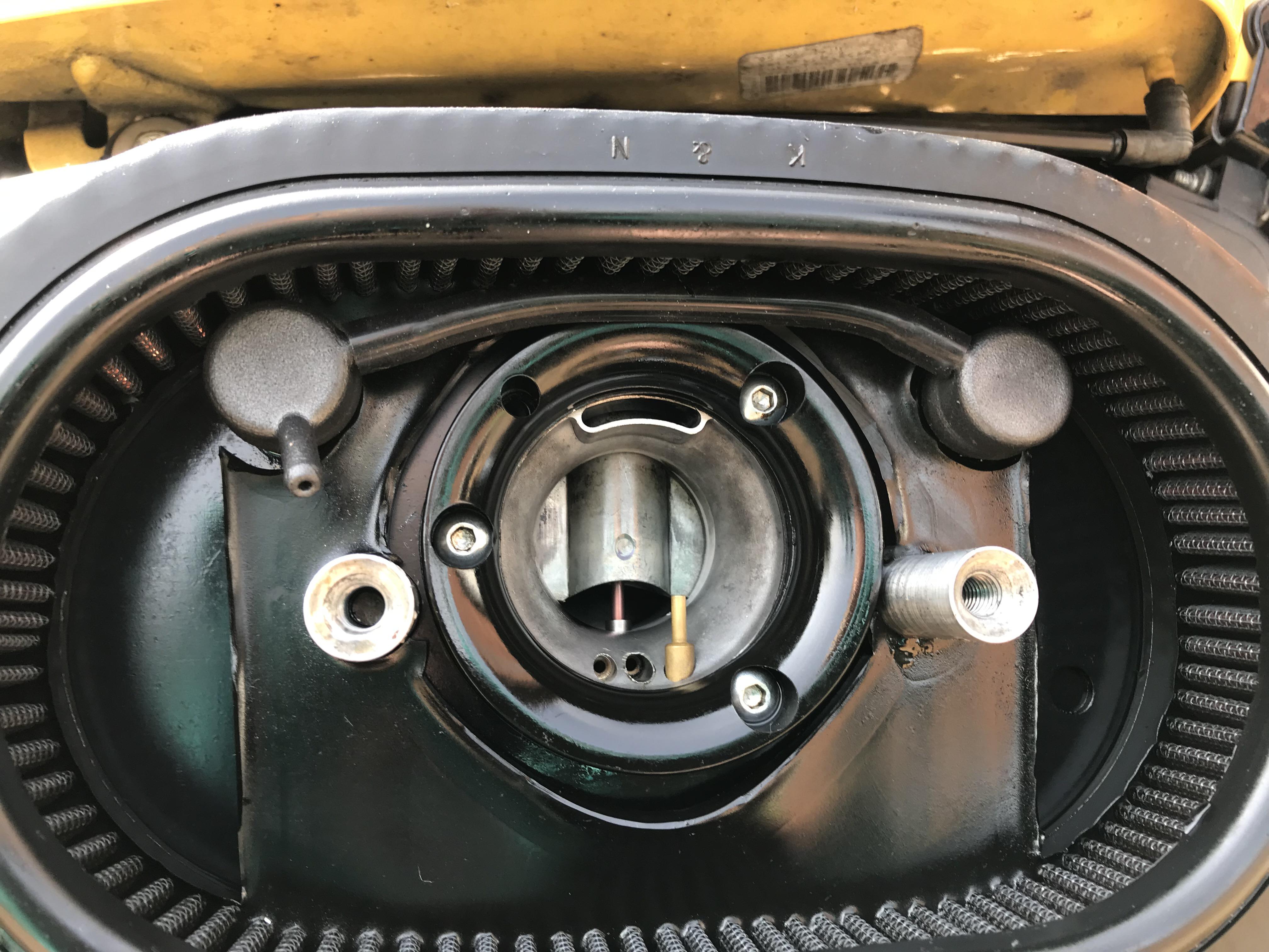 Rocker box breather bolt covers printed in sls and piston sealed with an oring. On the old