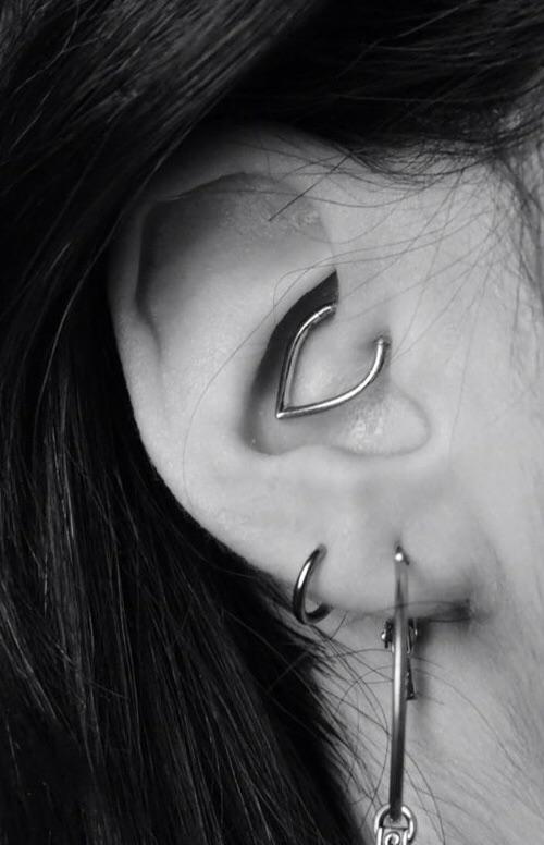 Fresh sideburn piercing, done by Liron Mor Dynamo Tattoo, Tel Aviv