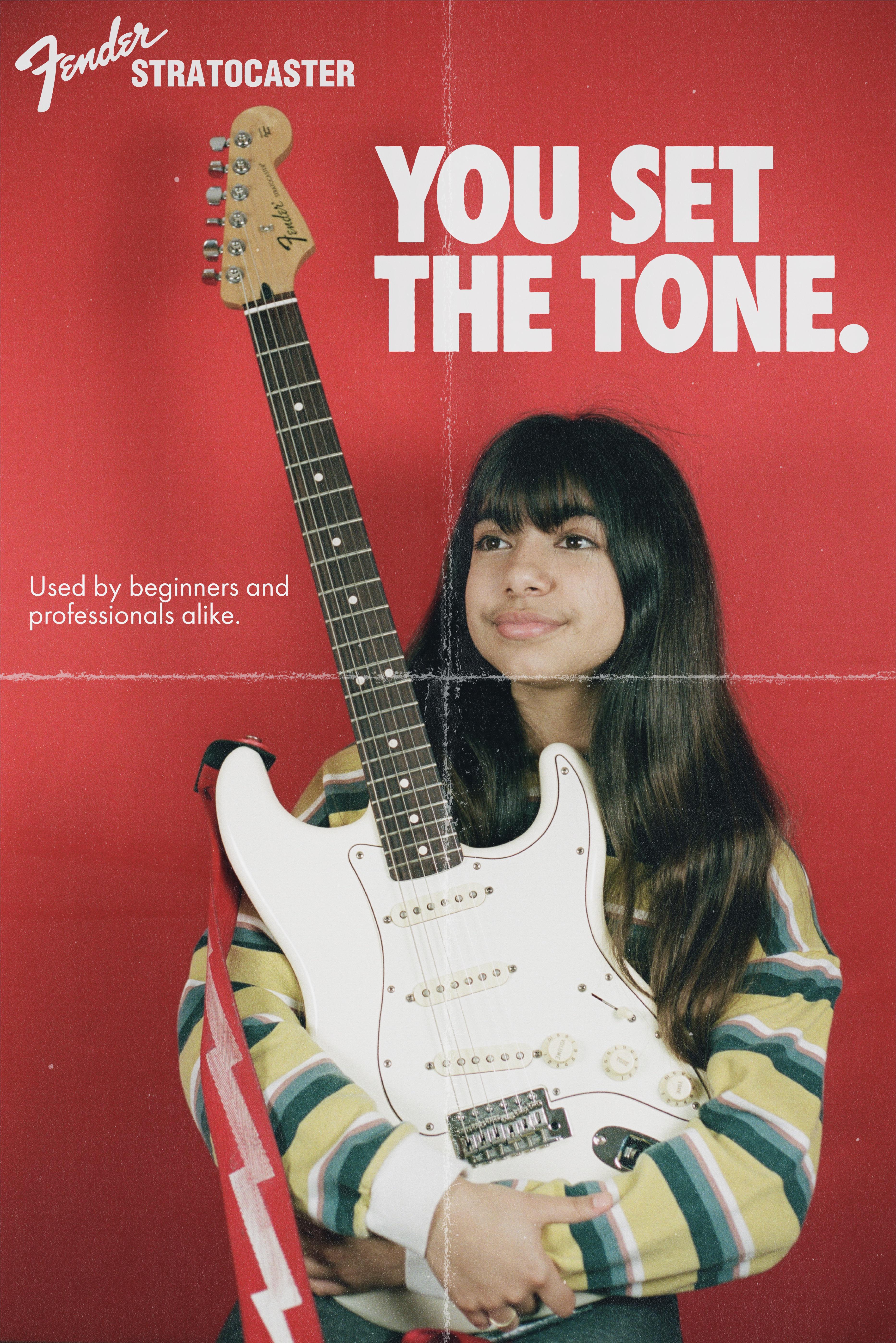 I took this photo of my sister and my strat with my film camera. I