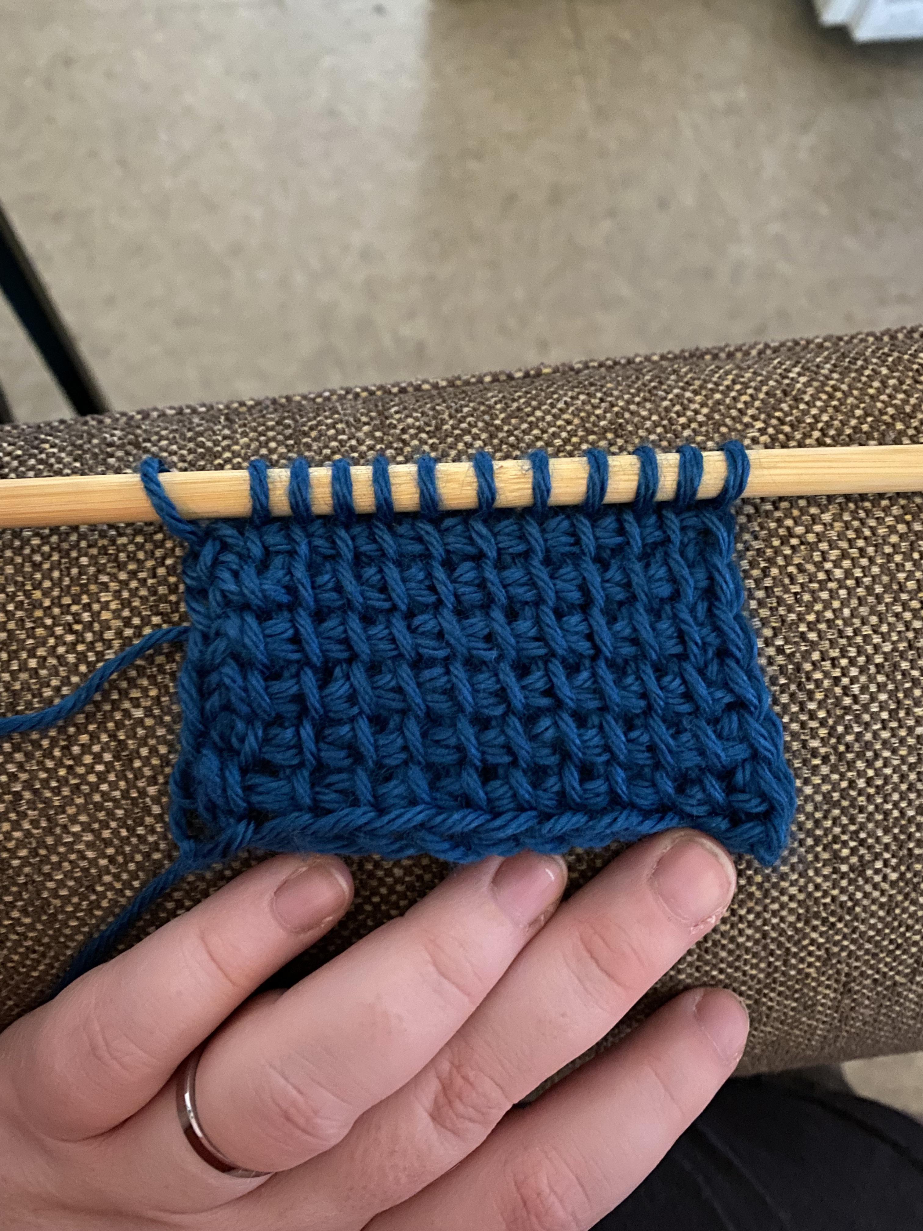 My first ever swatch of Tunisian crochet with the simple stitch. Still