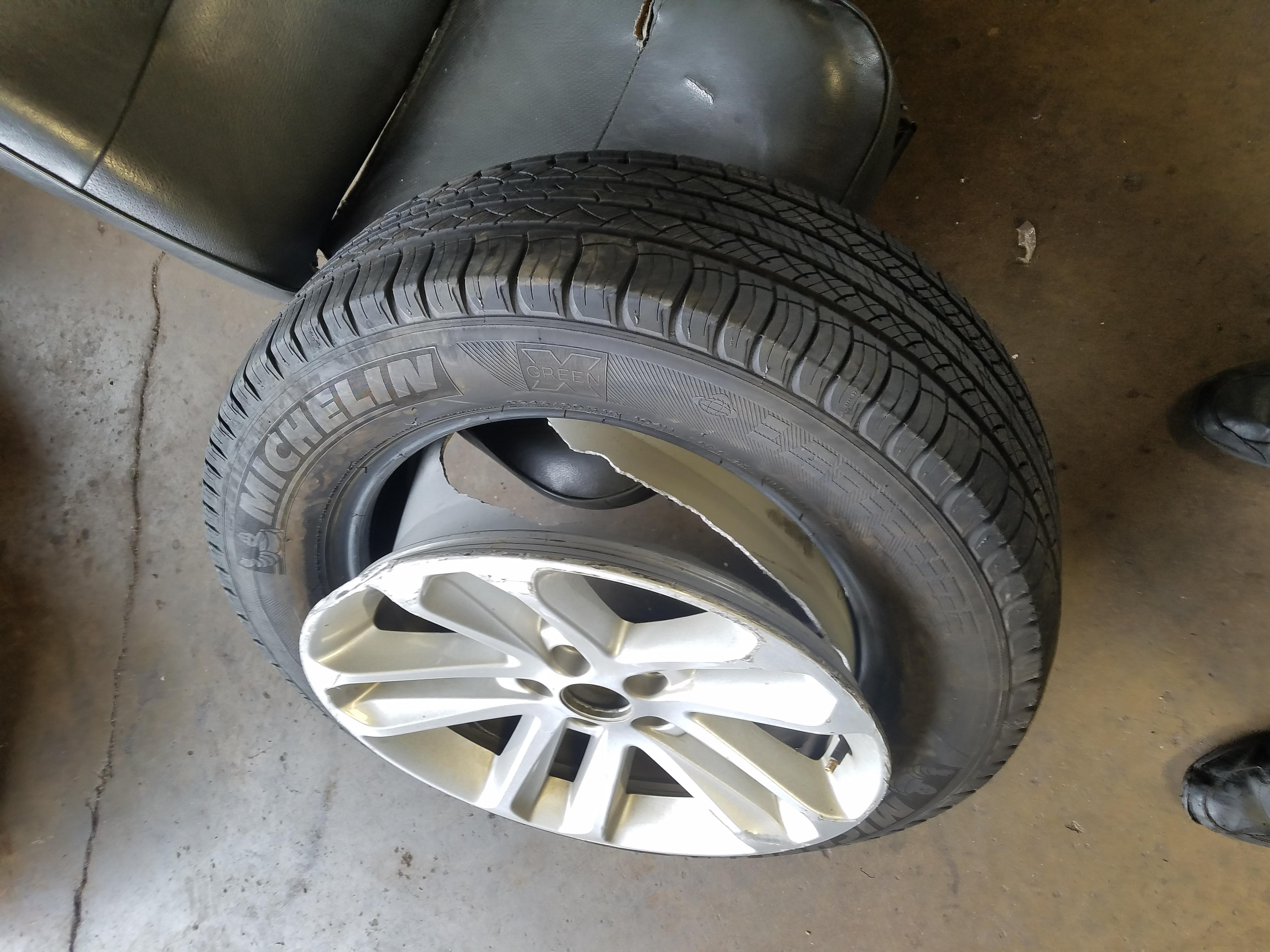 customer got nailed. new tire, rim, lower control arm, then off to the