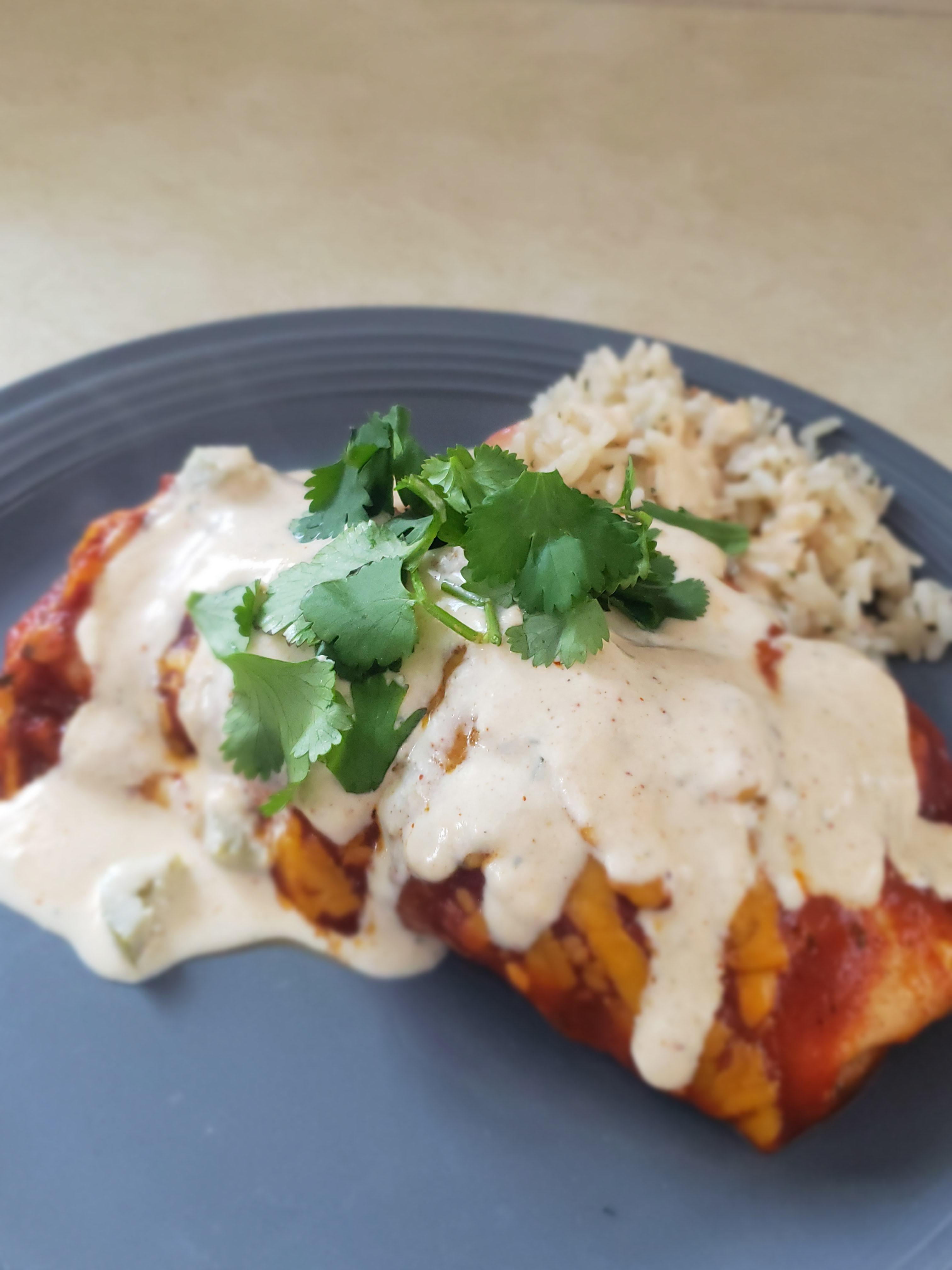 [Homemade] smothered chicken burritos with jalapeno crema sauce and