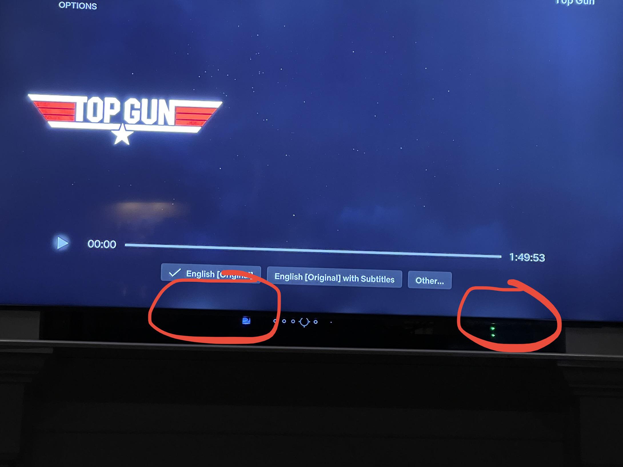 Why does my tv have these white spots along the edge of the image? r