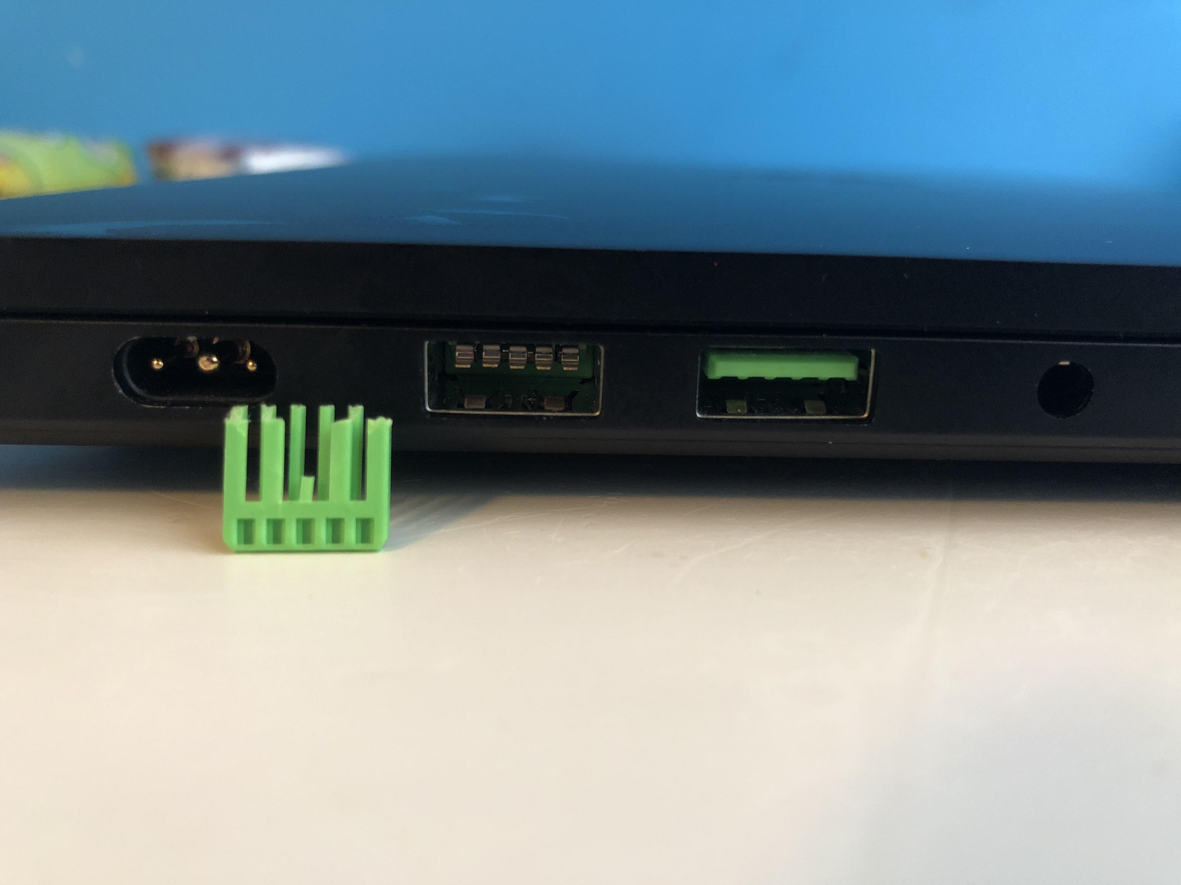Help?! The green part of my usb port break while I was taking out a usb