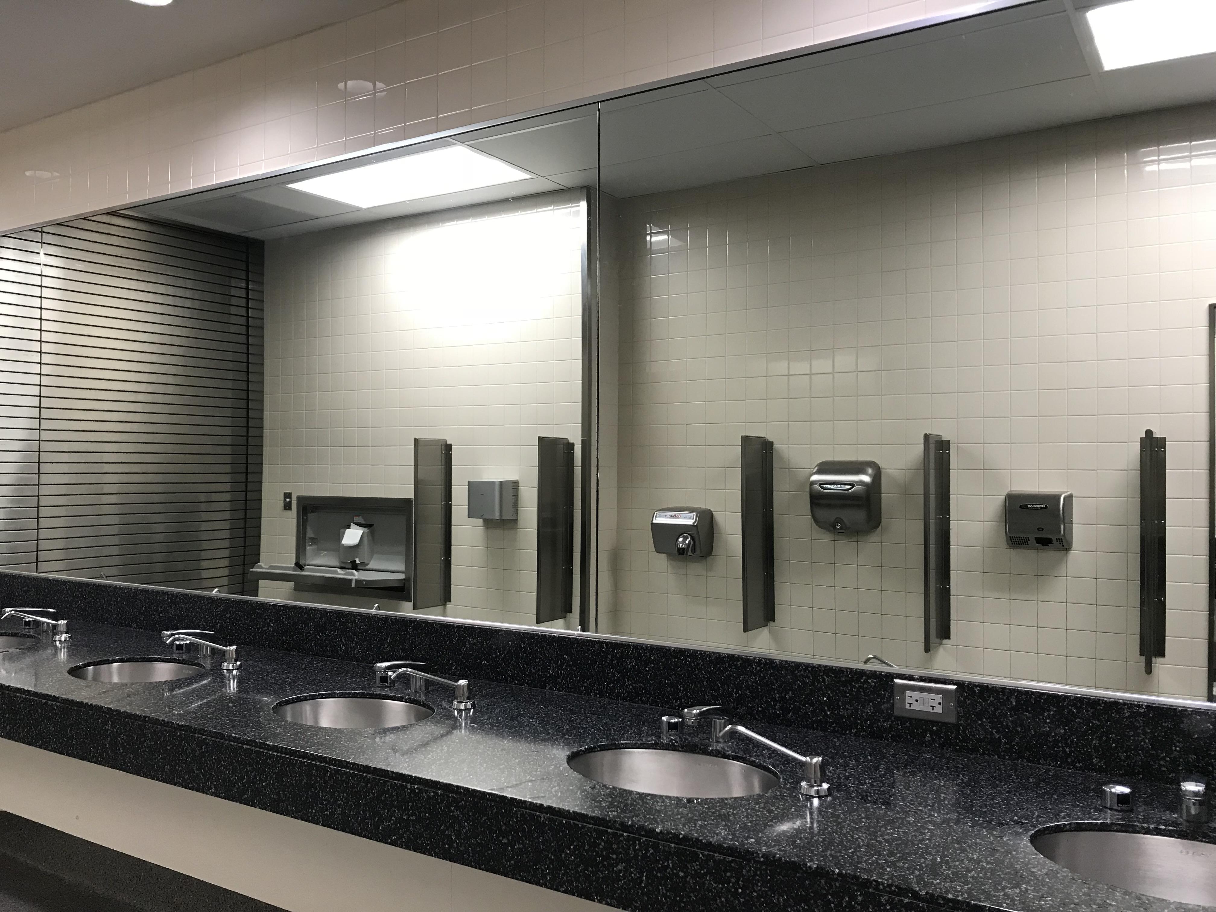 The women’s restroom at PDX has four different types of hand dryers r