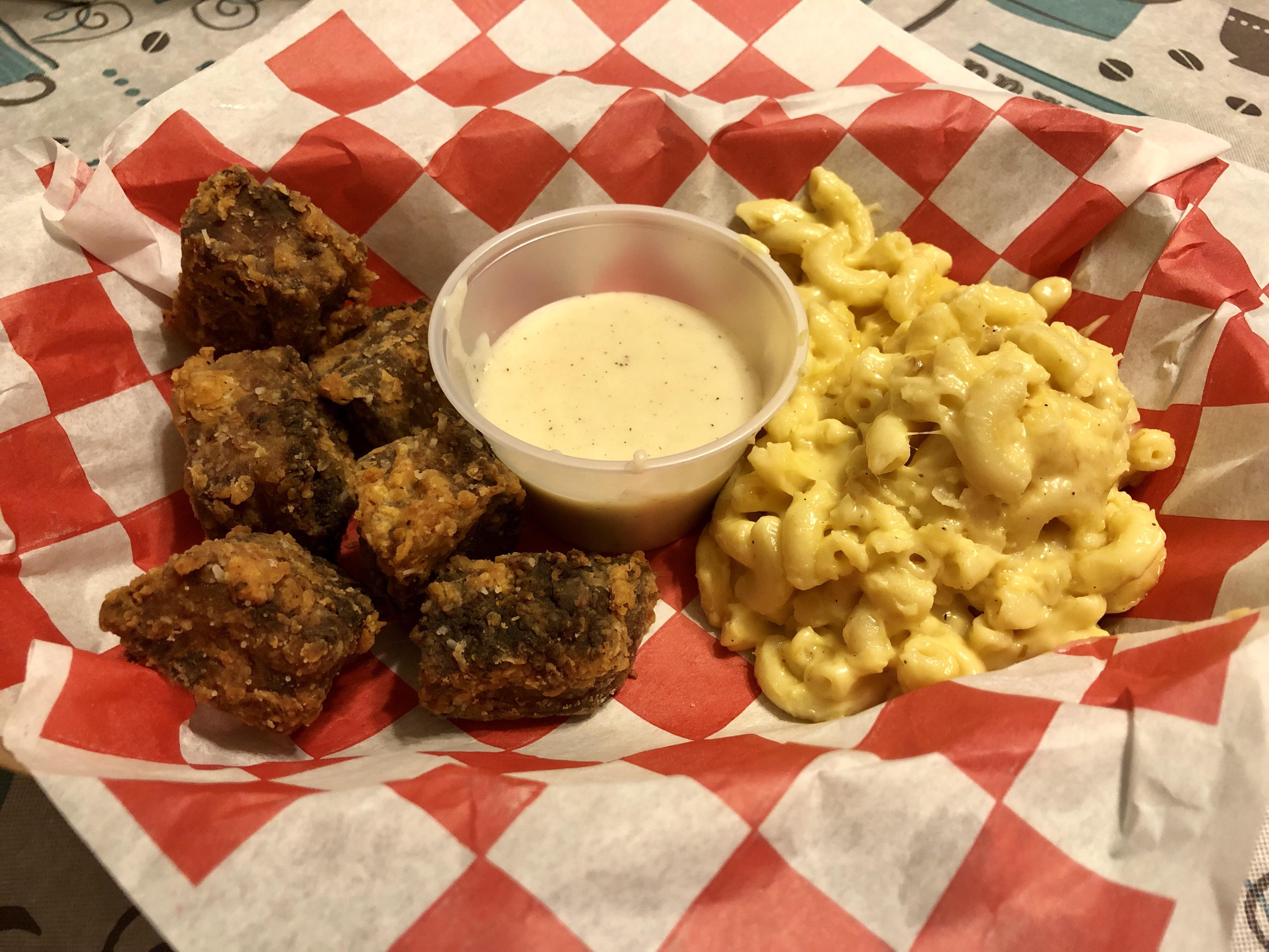 Chicken fried burnt ends with homemade pepper gravy and smoked mac n