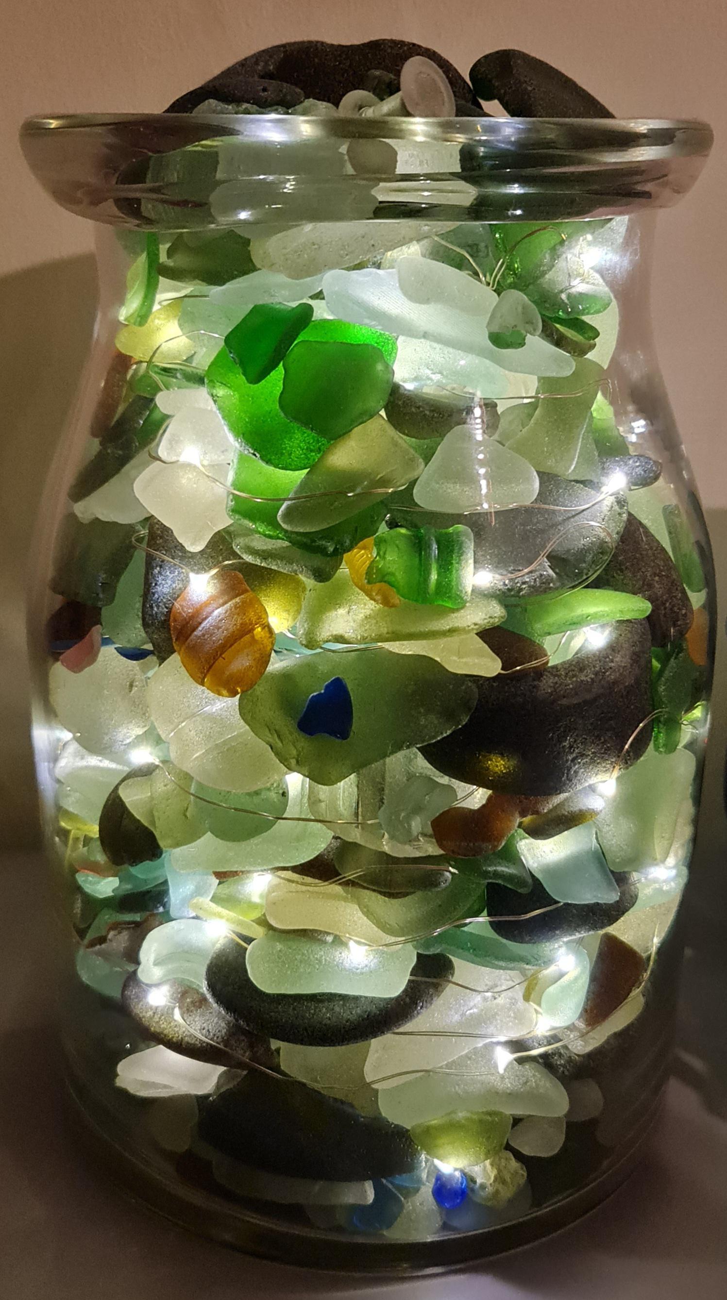 I made this lit up seaglass jar from seaglass I found throughout Fife