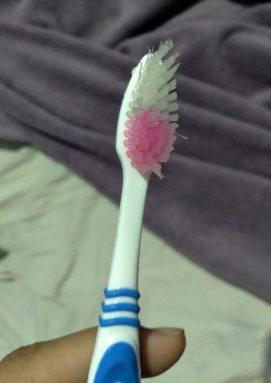 A friend of mine related about her toothbruth turning pink. What could
