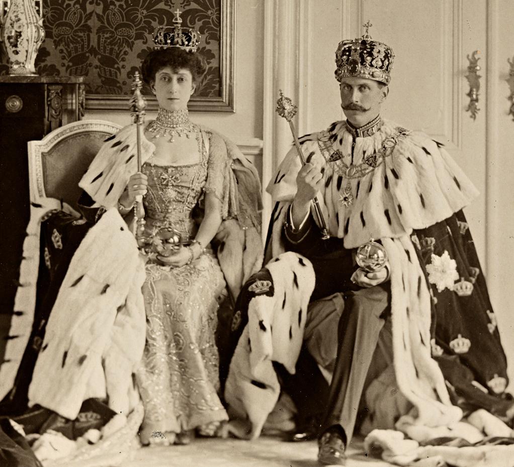 King Haakon VII and Queen Maud of Norway with their regalia, 1906. r