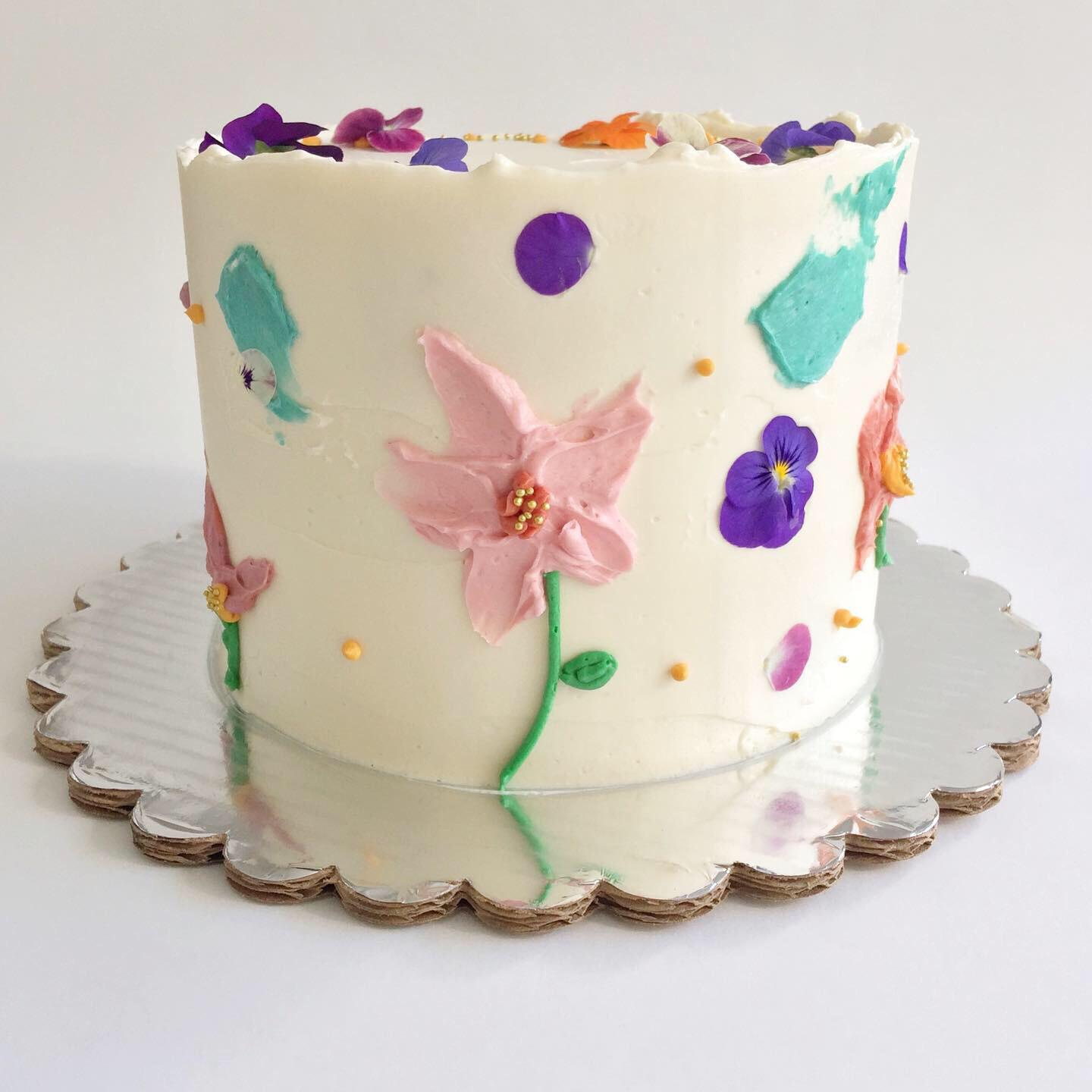 Practicing hand painted buttercream flowers. Also I love mixing it with