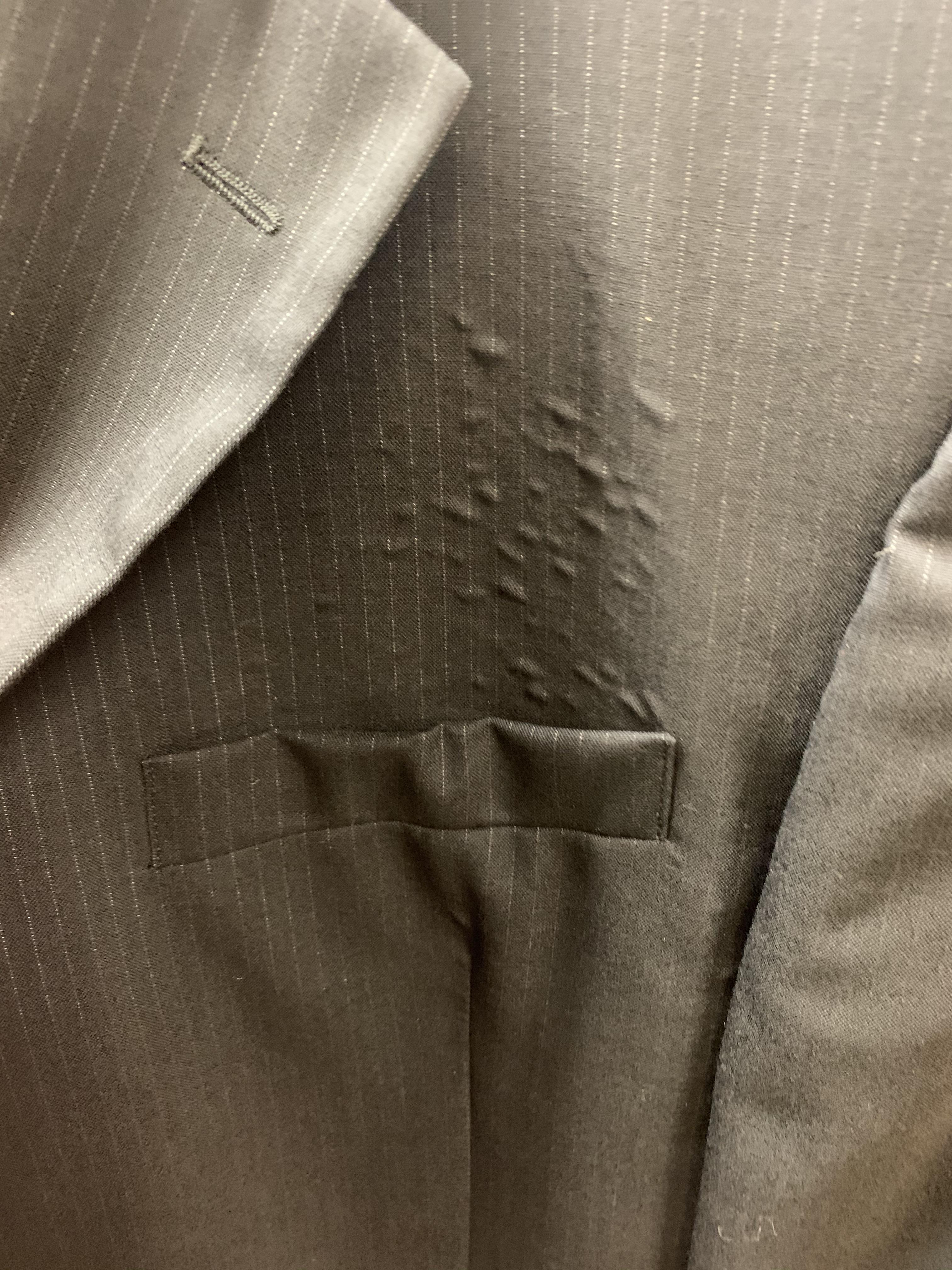 These bubbles are from the heat by dry cleaning. It’s the glue on the fabric. Means it’s a cheap