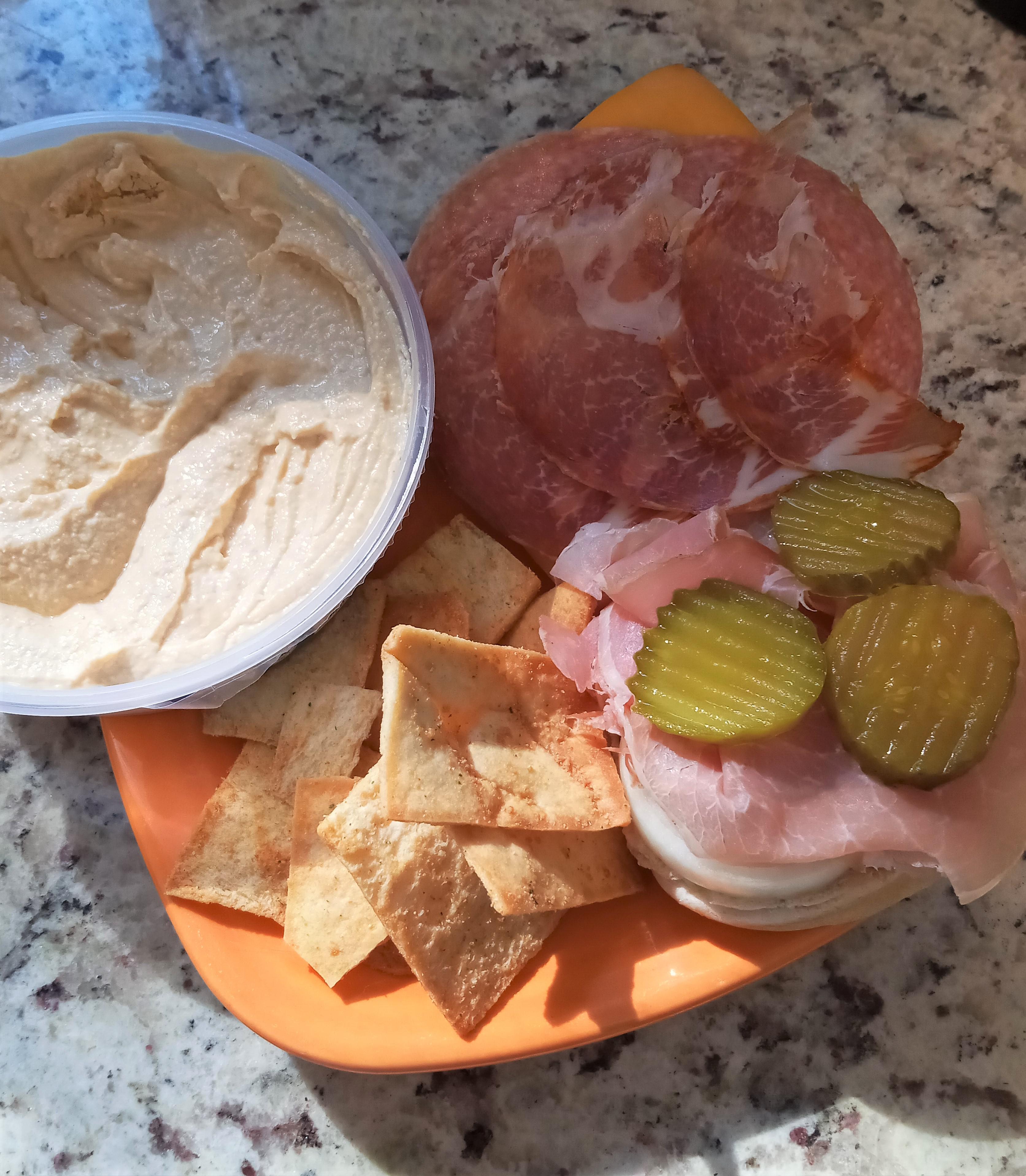 Spicy capicola, prosciutto, salami, Vermont cheddar, onion, pickle