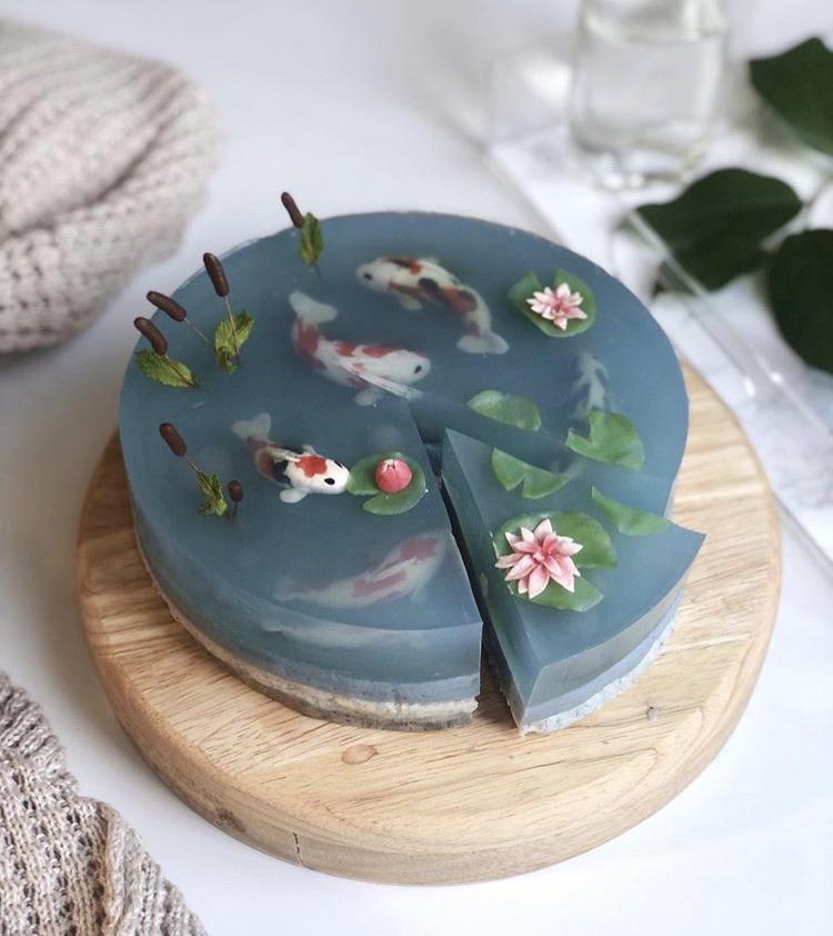 This koi pond sculpture is actually cake and 100 edible. Cake artist