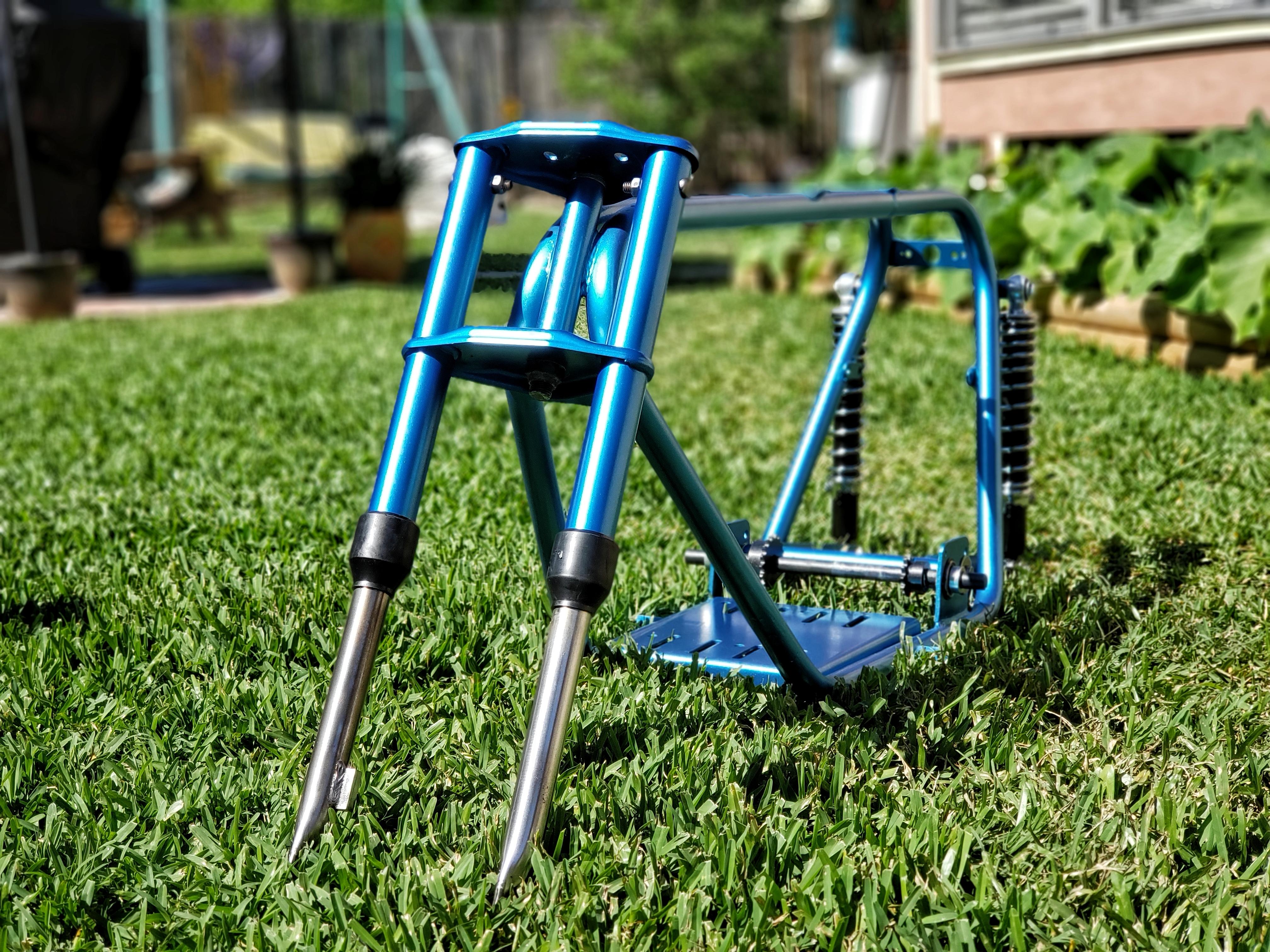 Project Bonanza got forks, a swing arm, and jack shaft today. r/minibikes