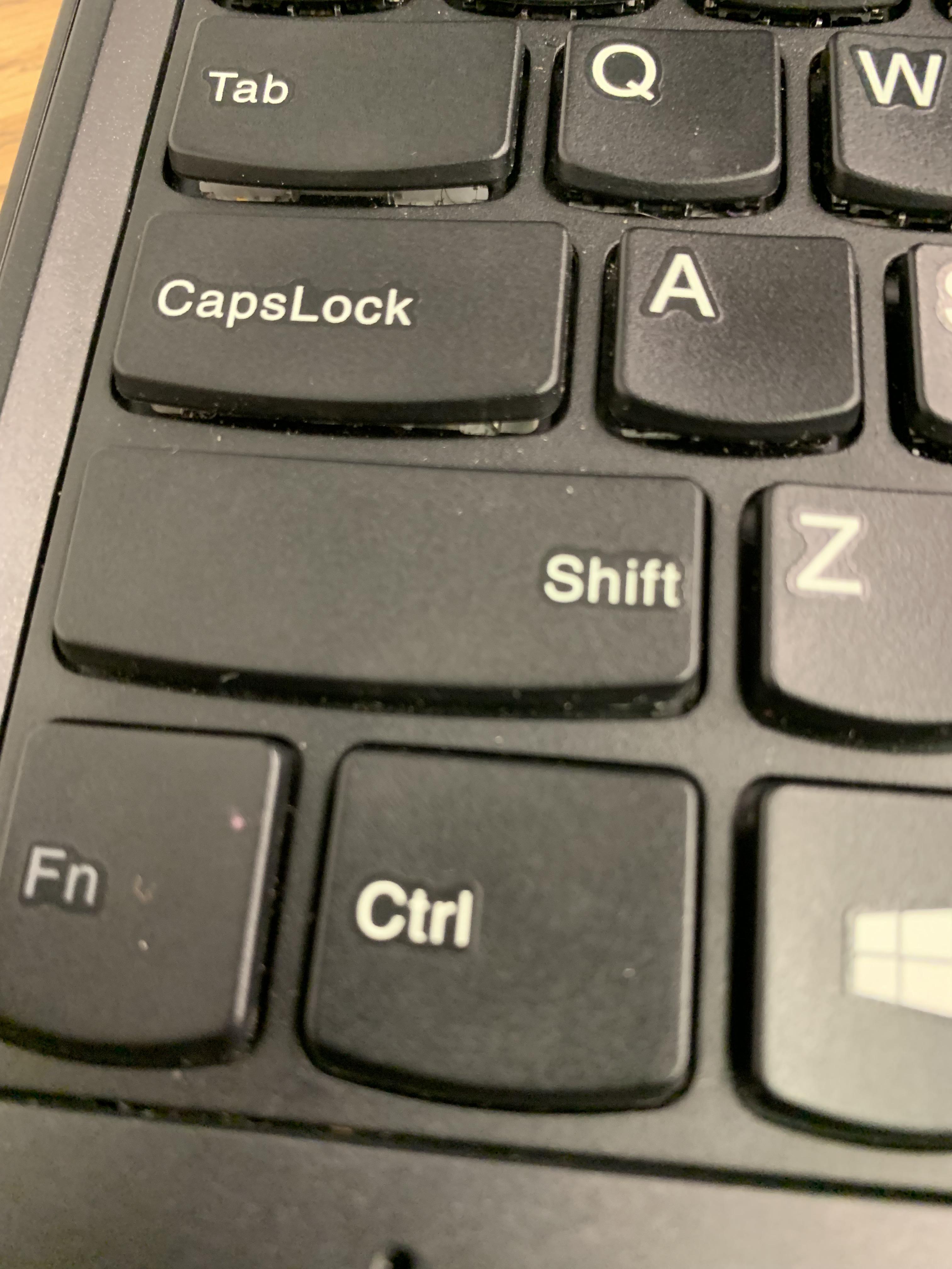 Shift. on the right side on button.. SHIFT ? r/mildlyinfuriating