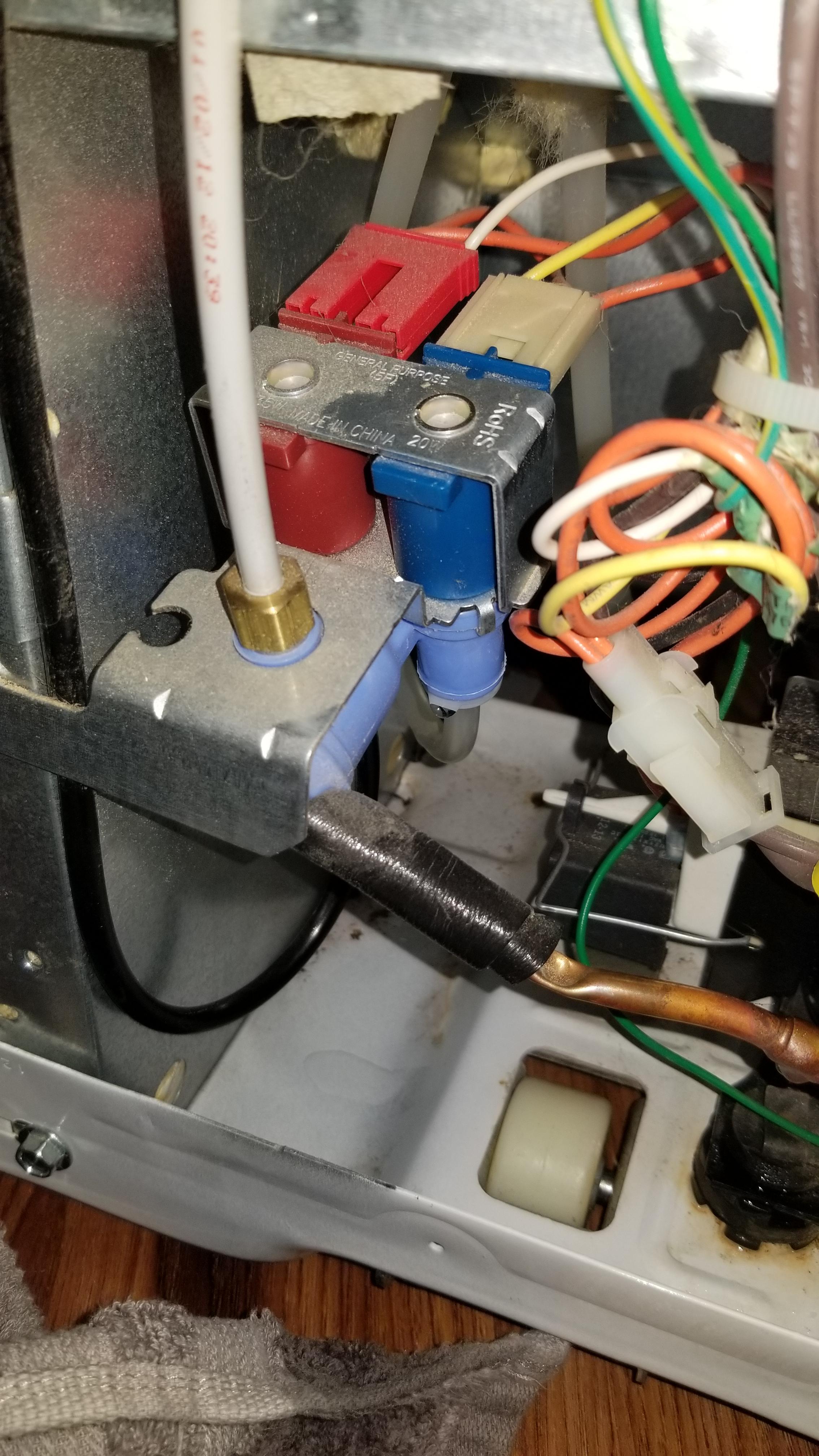 GE Refrigerator (Model GSHF3KGZBCWW) water leaking under the unit