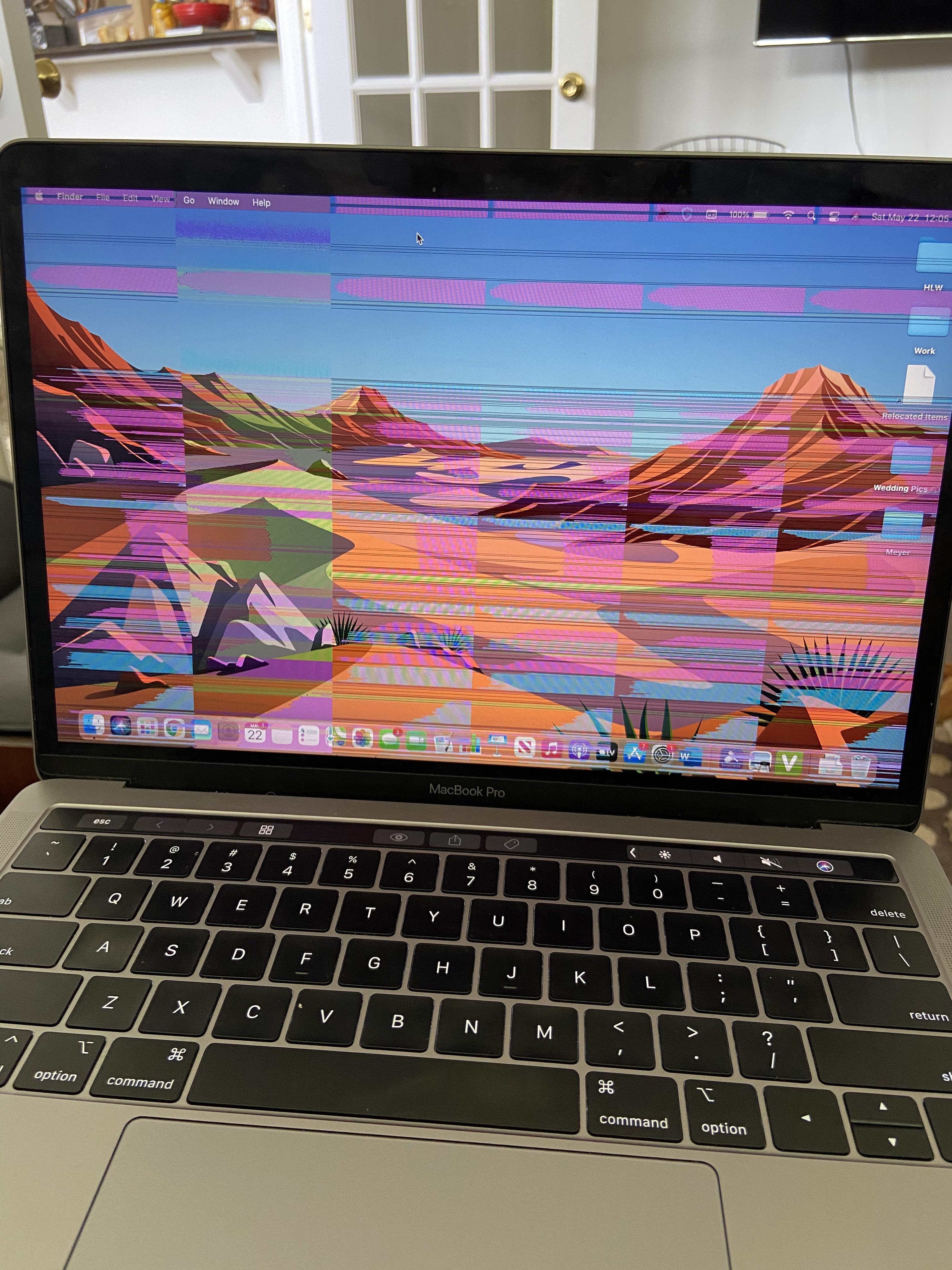 Screen flickering. Water damage? How much will this cost to fix? Worth