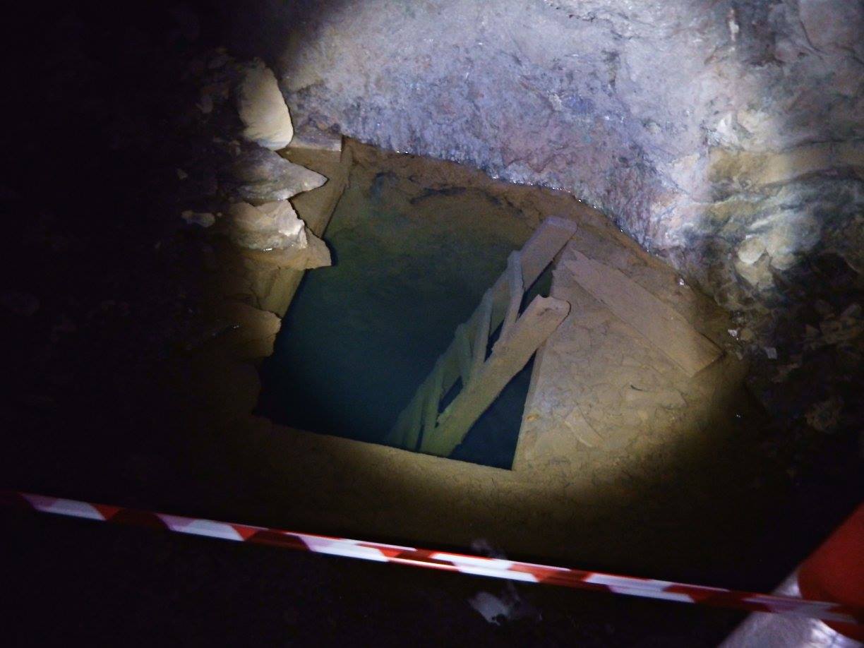 A flooded shaft in a 20th century copper mine, West Cork, Ireland. The