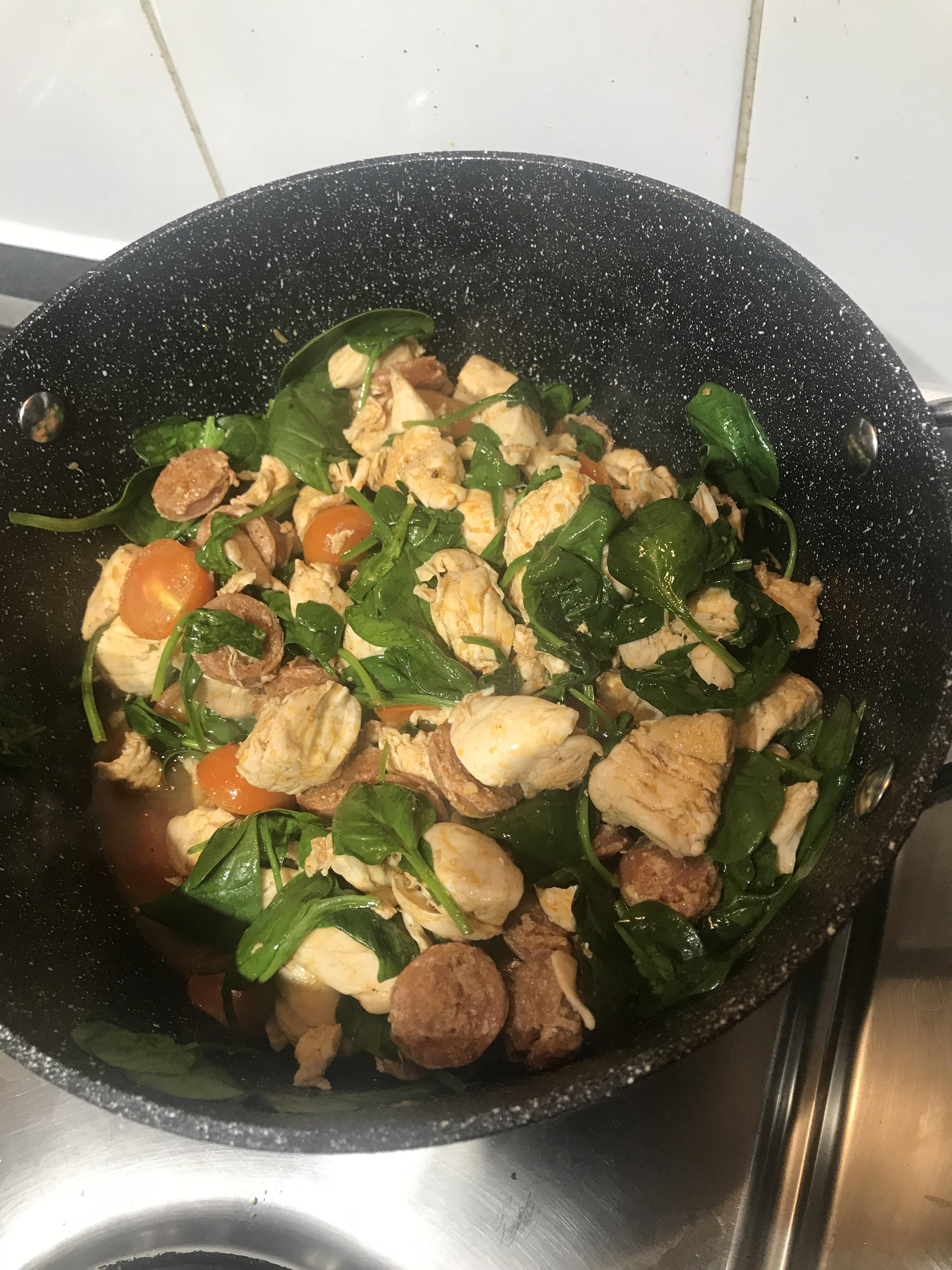 Chicken, chorizo, spinach and cherry tomato. Served with brown rice r