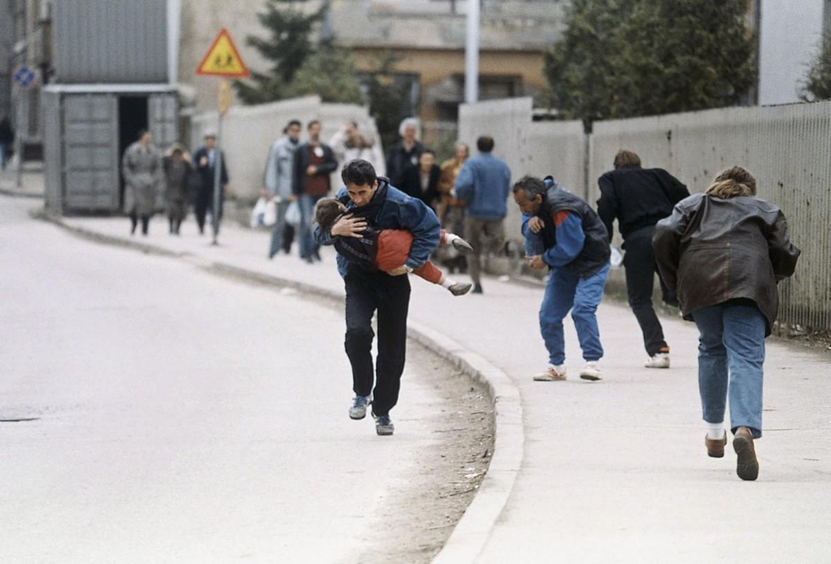 Sarajevo on this day, exactly 27 years ago. A Bosnian man cradles his