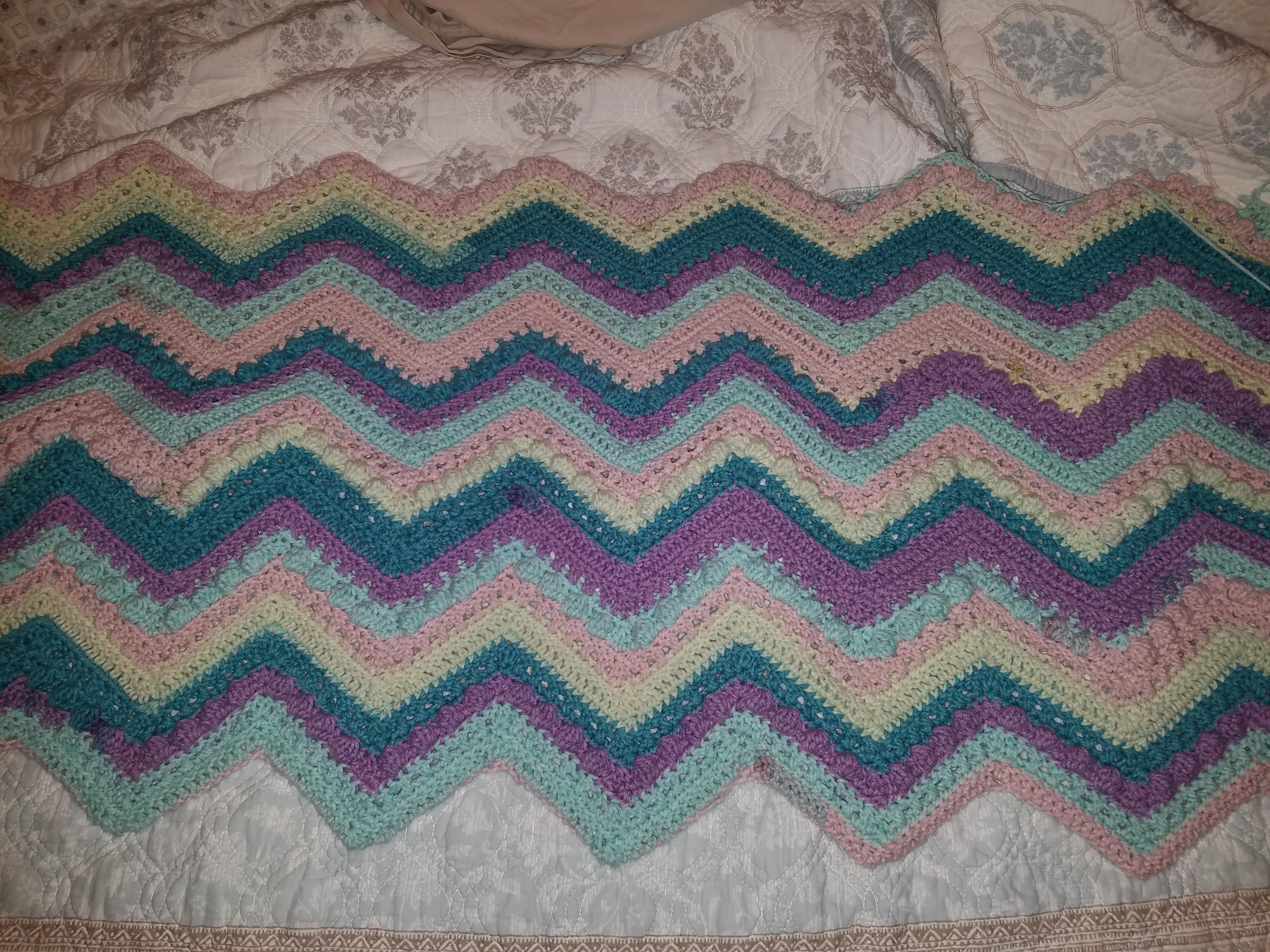 Working on the hugs and kisses blanket for my daughter r/crochet