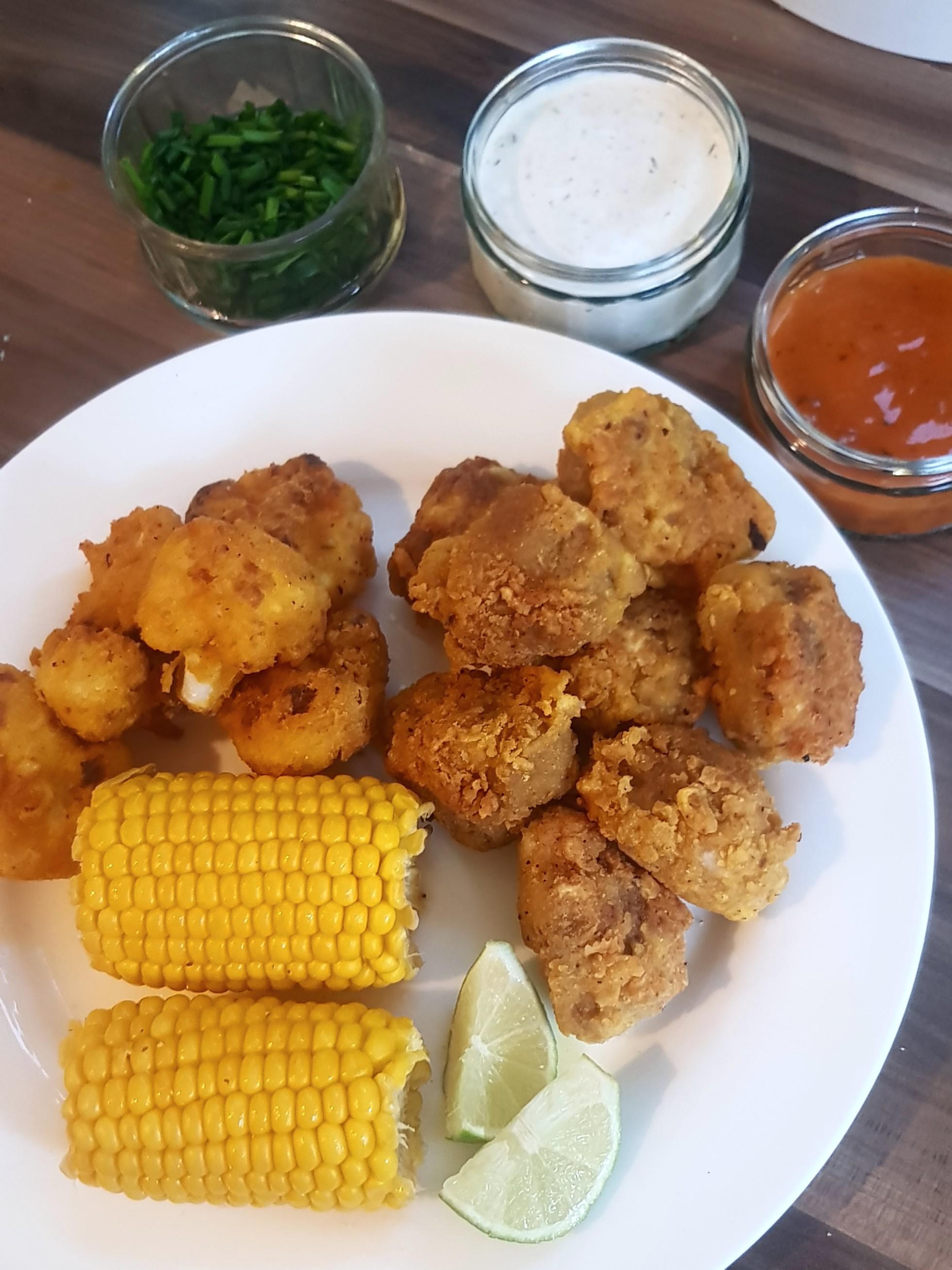 Deep fried cauliflower, deep fried seitan and corn on the cob, with