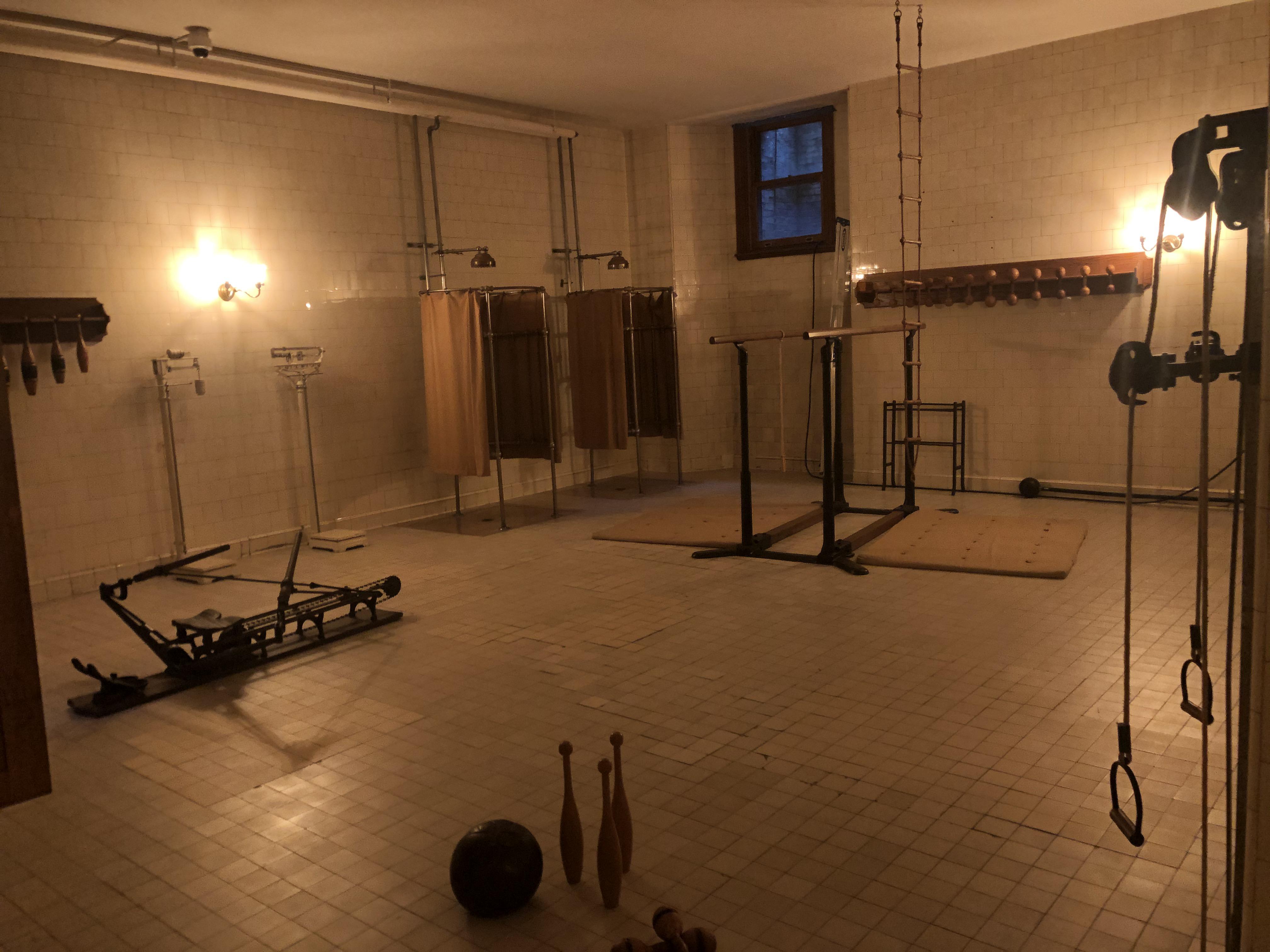 1890s Home Gym at the Biltmore Estate rower, Indian clubs, parallel