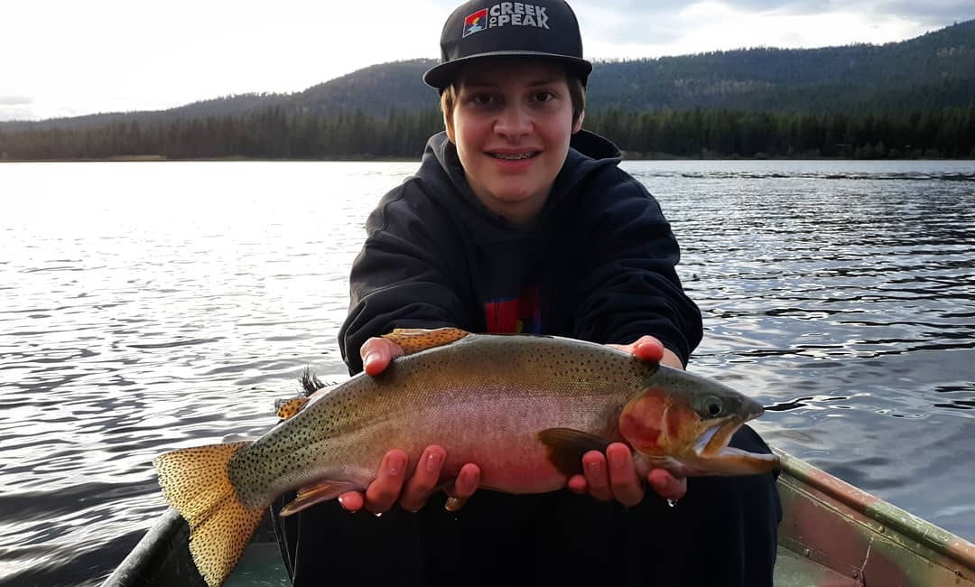 My sons first fish while fly fishing. The perfect way to get em hooked