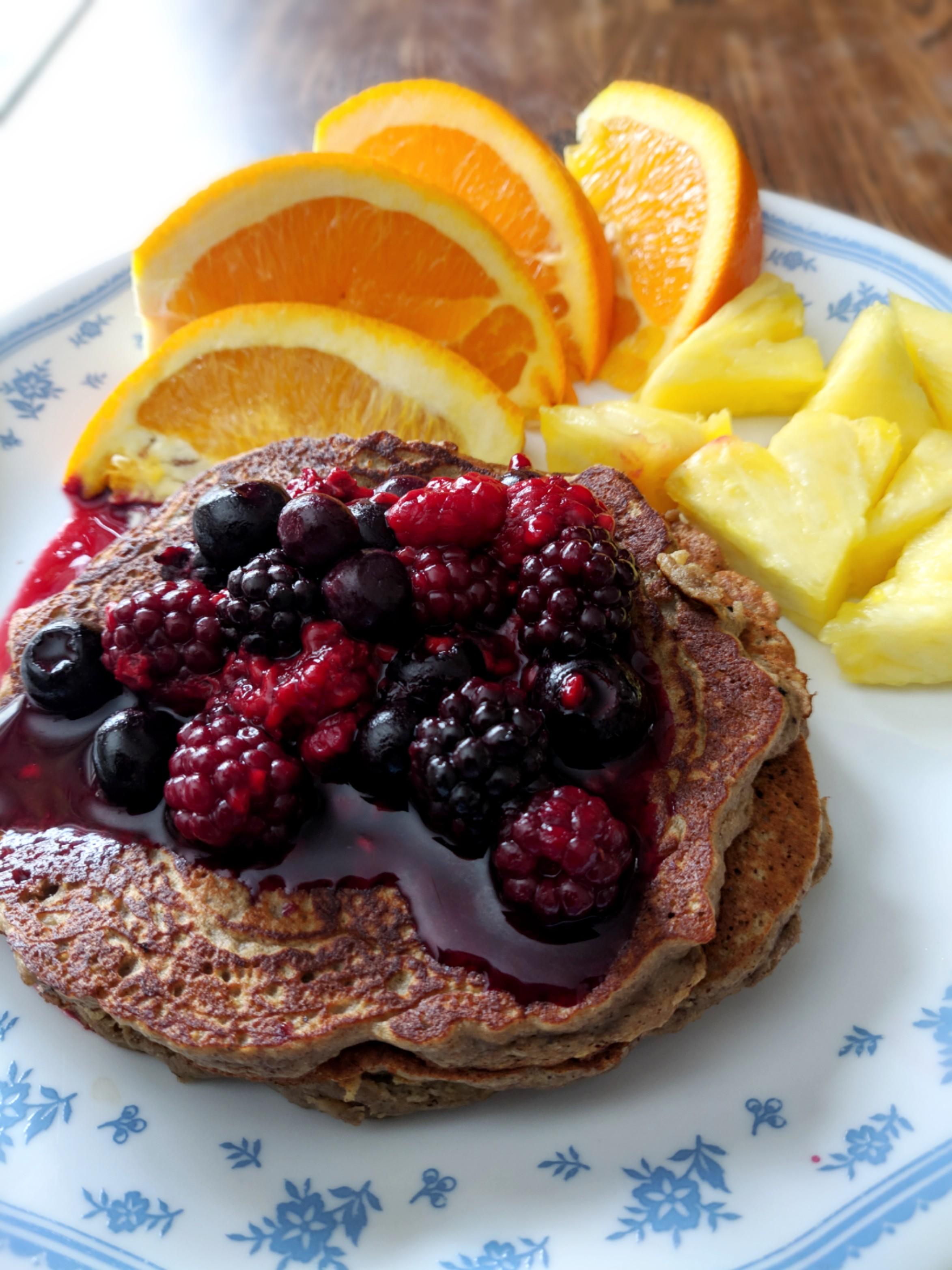 313 calories. bananaeggprotein pancakes with 1/2c frozen berries, 1