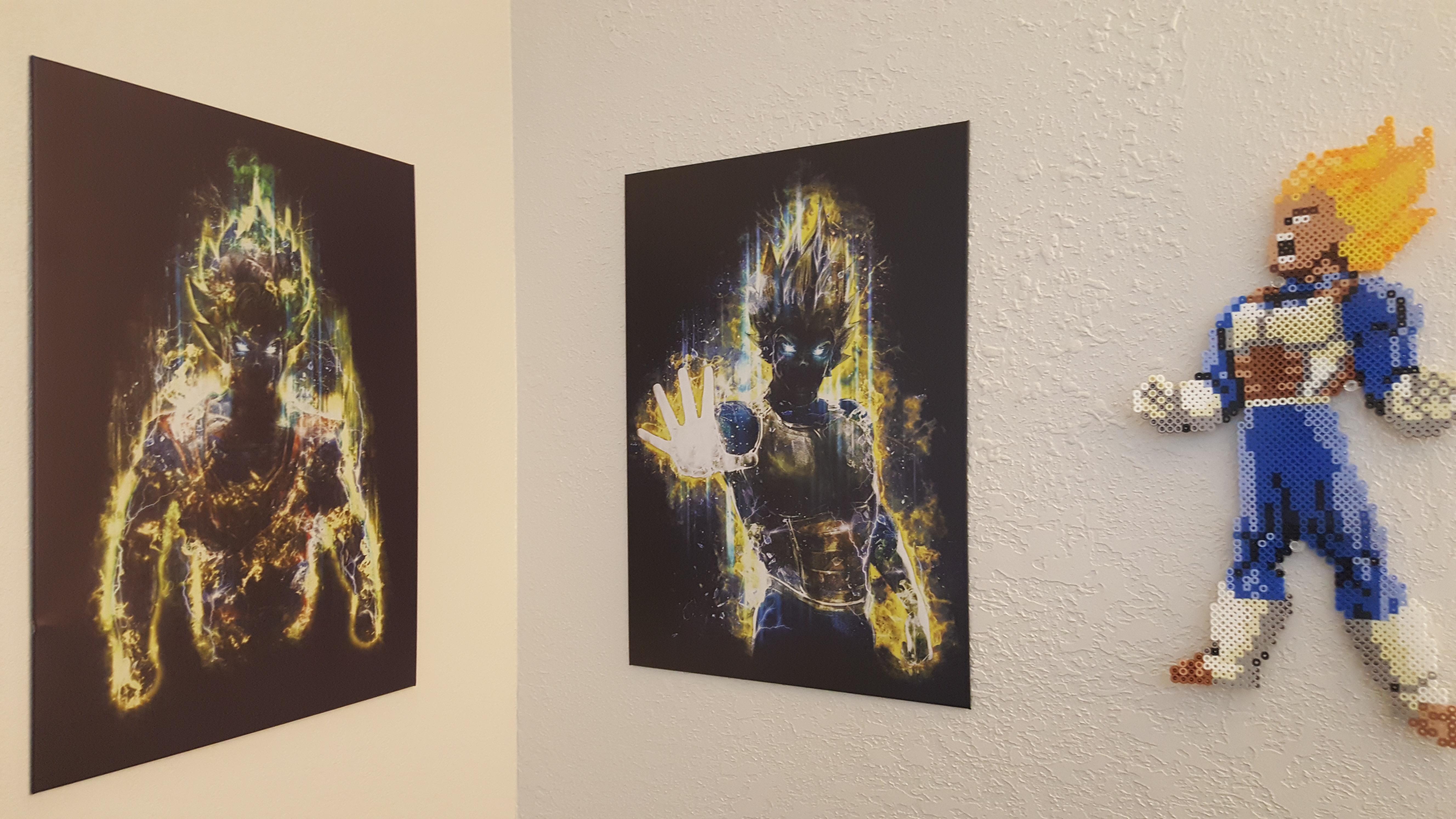 Metal posters from Displate I hung over my desk by the Super Vegeta