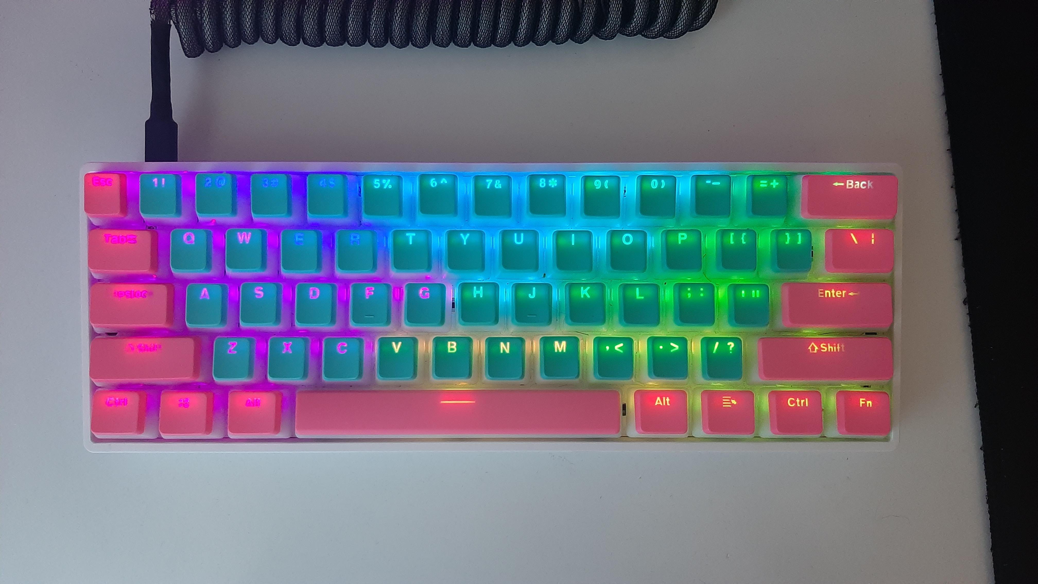 I ended modifying my GK61 with lubbed Silver Optical Switches and pink