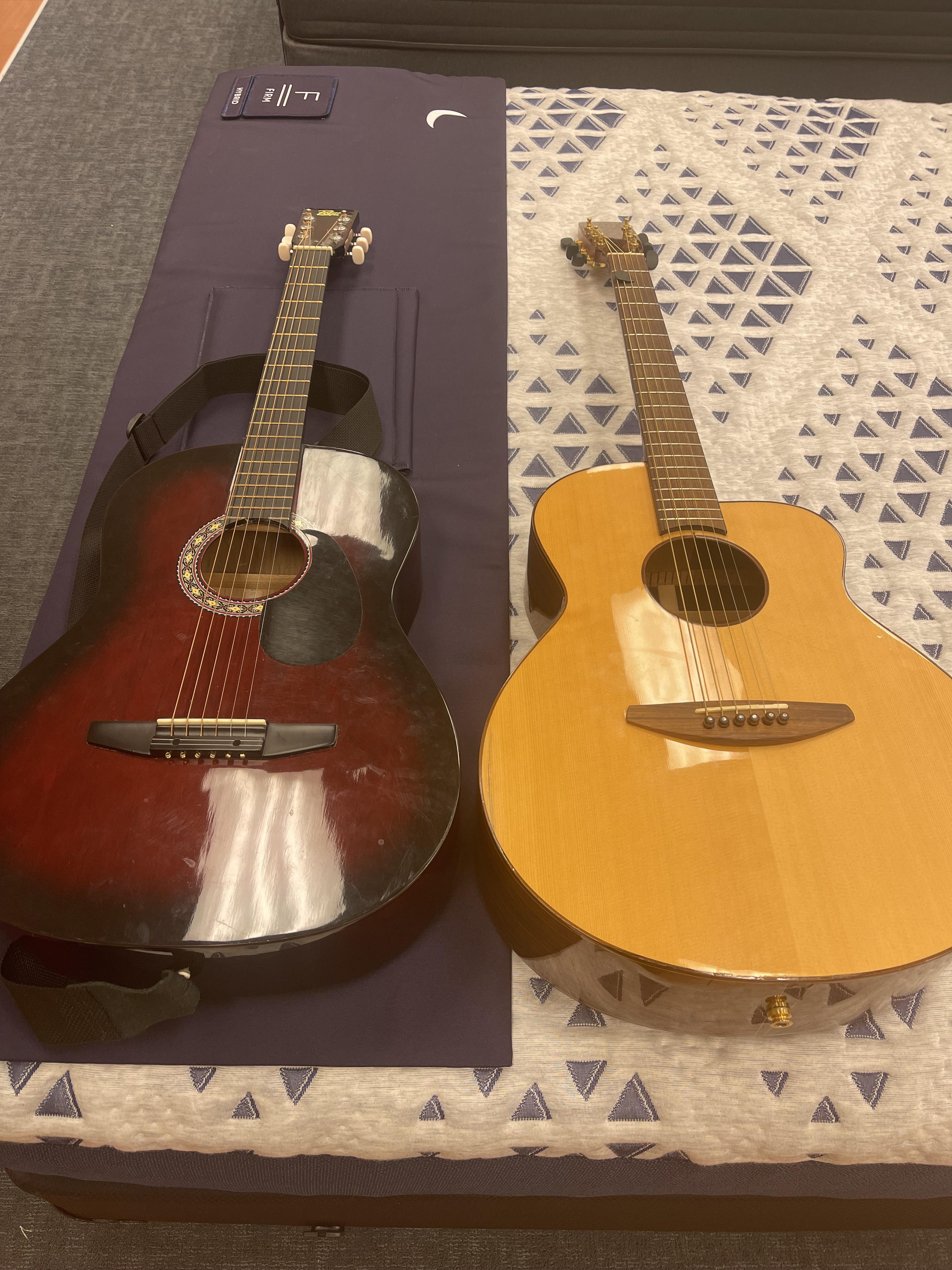 My 50 pawn shop guitar (left) In comparison to my coworkers 800