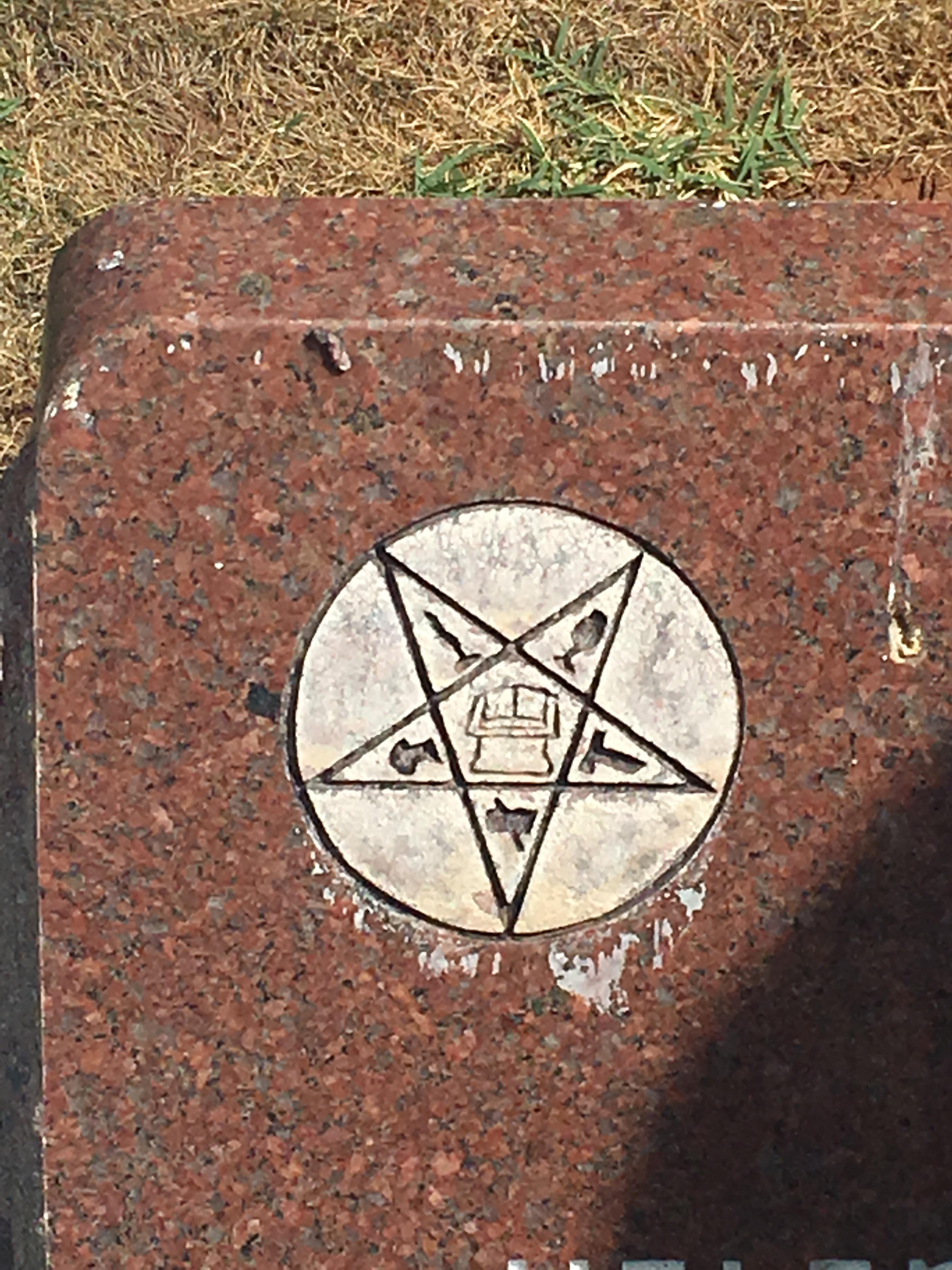 Found several of these symbols in a graveyard. What does it mean? r