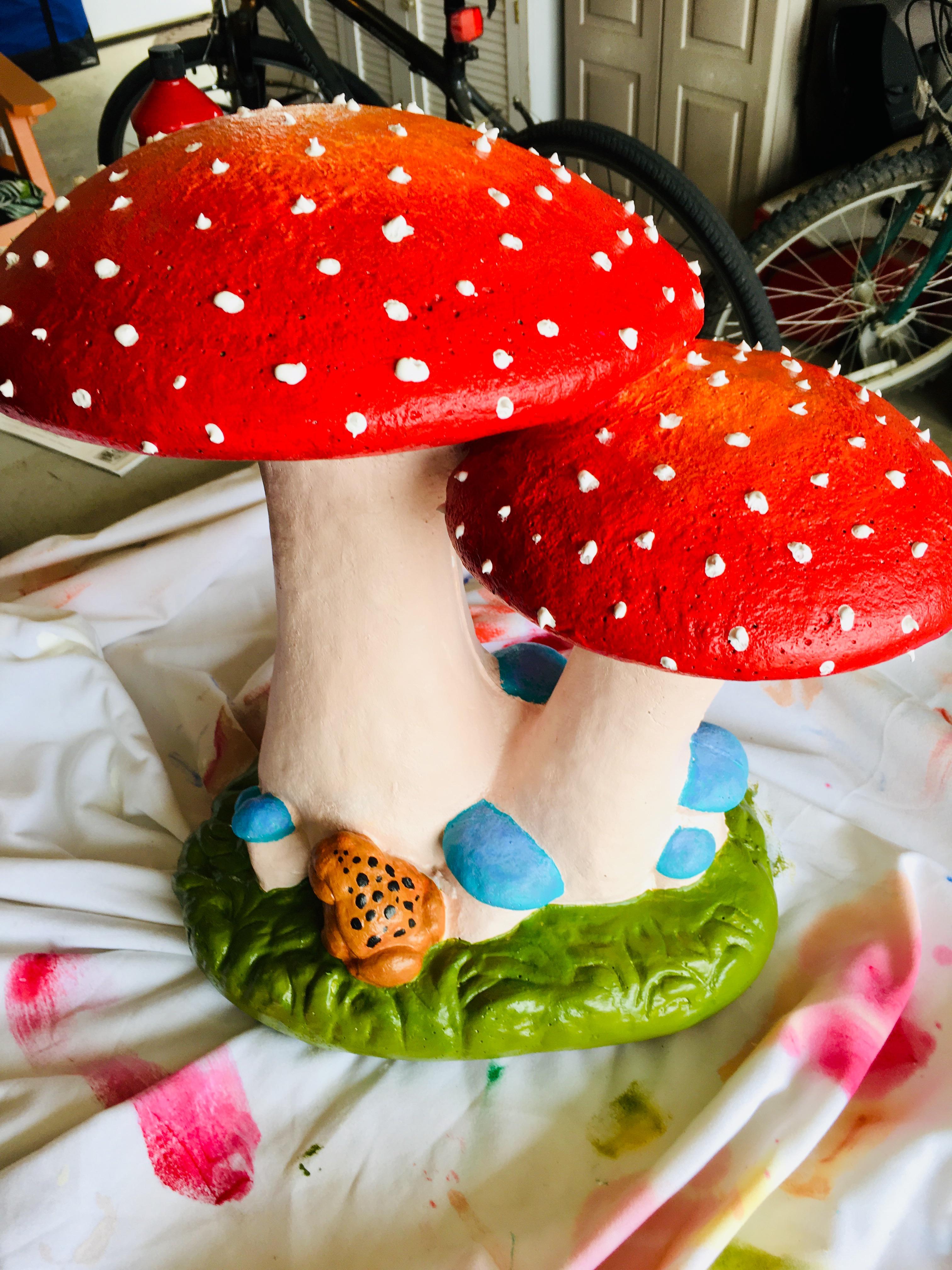 Started out as an ugly cement garden statue. I decided to spruce it up