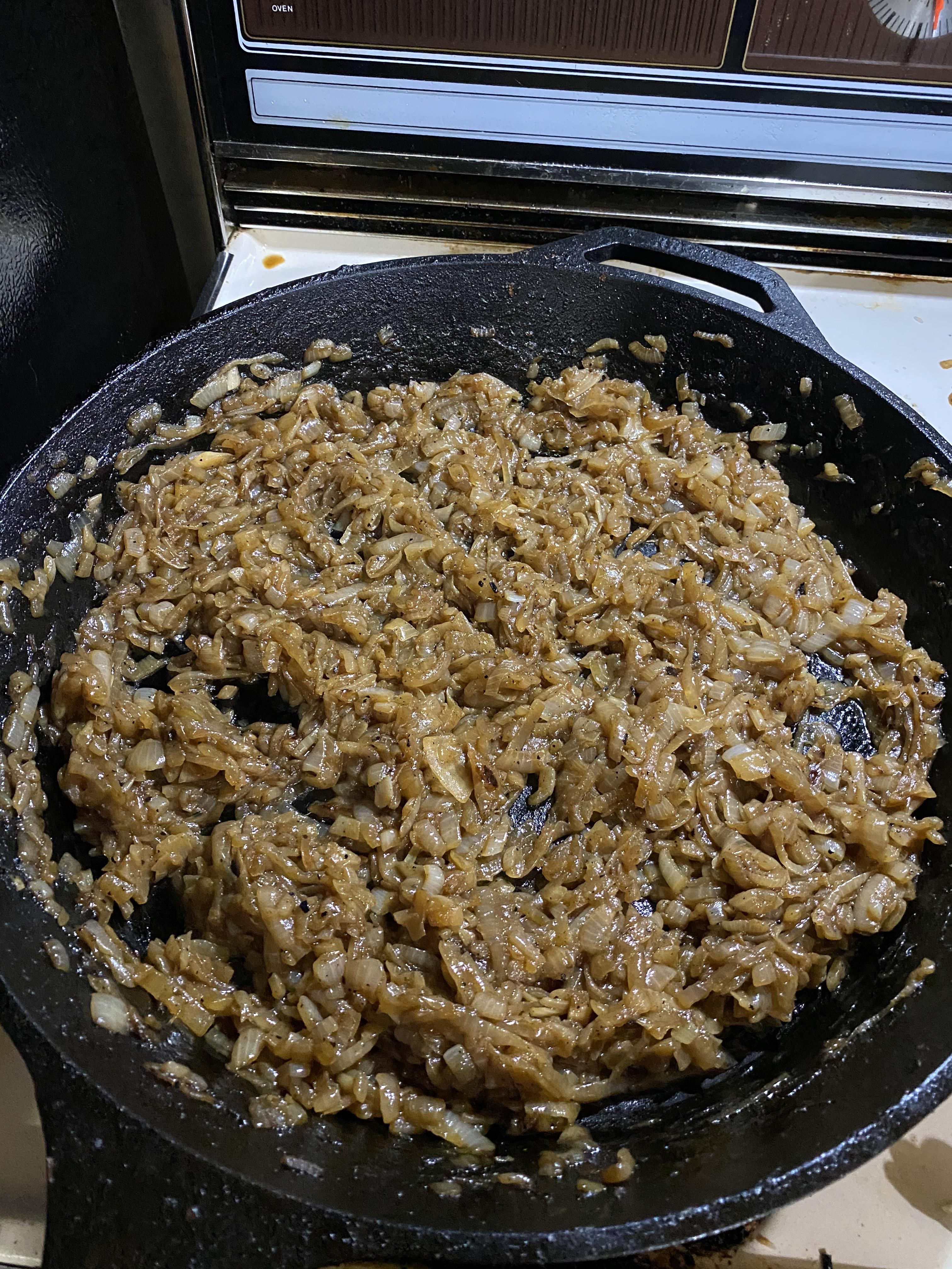5lbs of cast iron caramelized onions in a 15” pan. r/OnionLovers