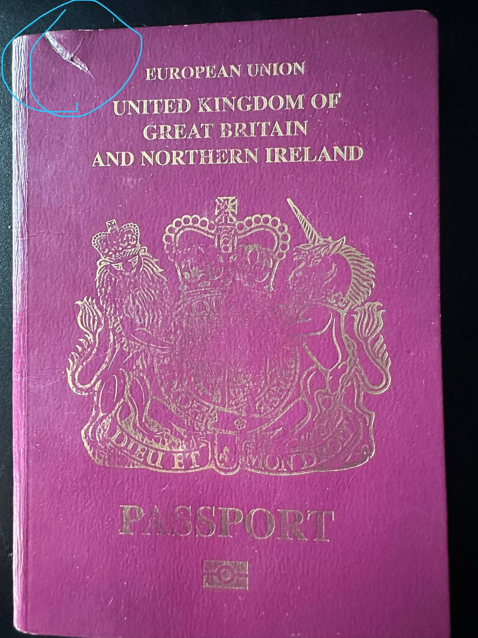 is this damage on the front of my UK passport likely to cause issues