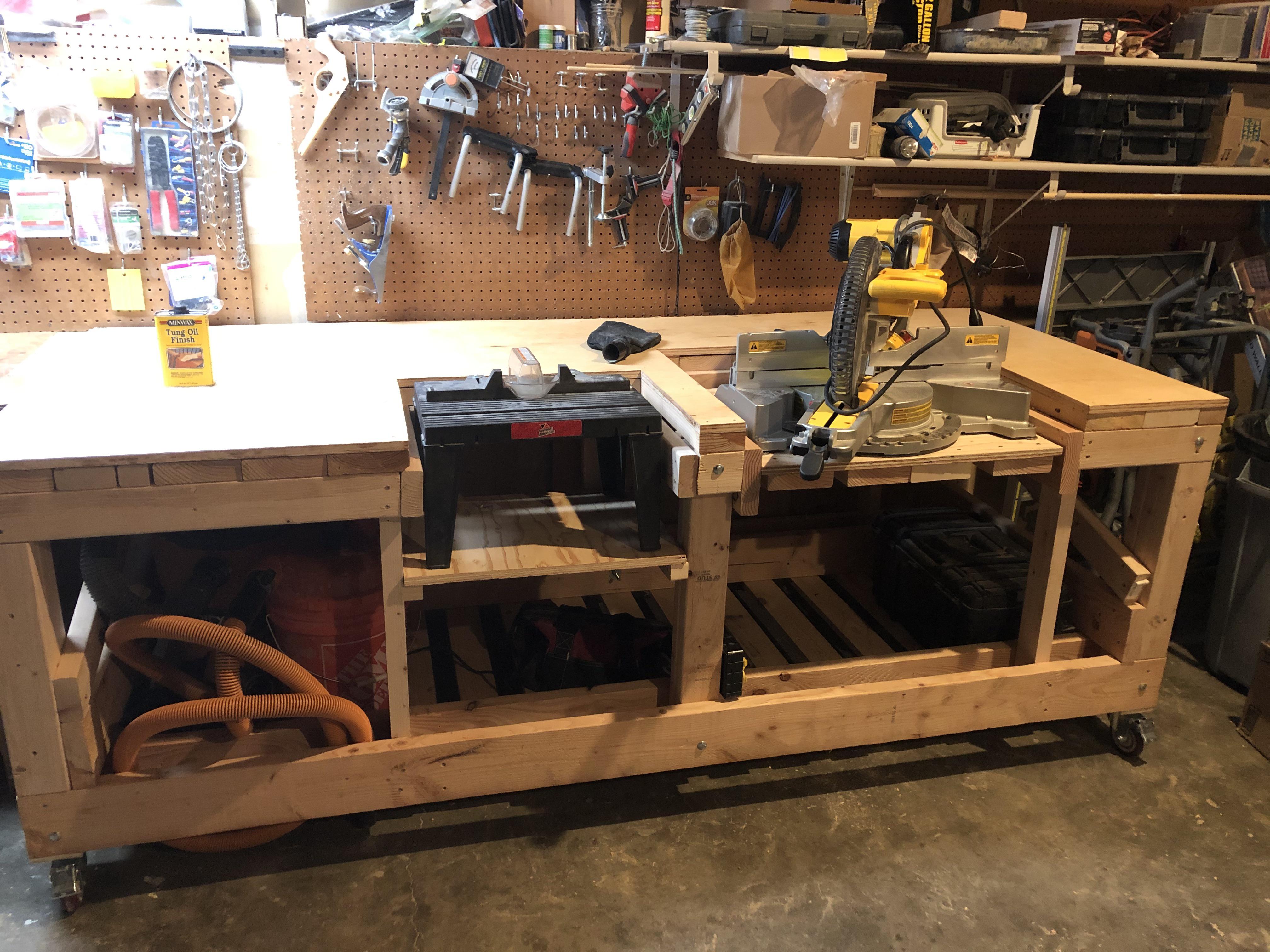 Mostly finished the new bench this evening. Fliptop miter station. Slider for the router. Been